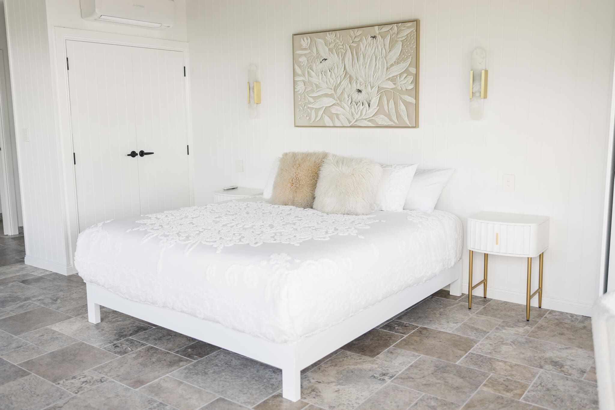 King sized bed in the honeymoon suite at the Ambrym Estate wedding venue near Yeppoon