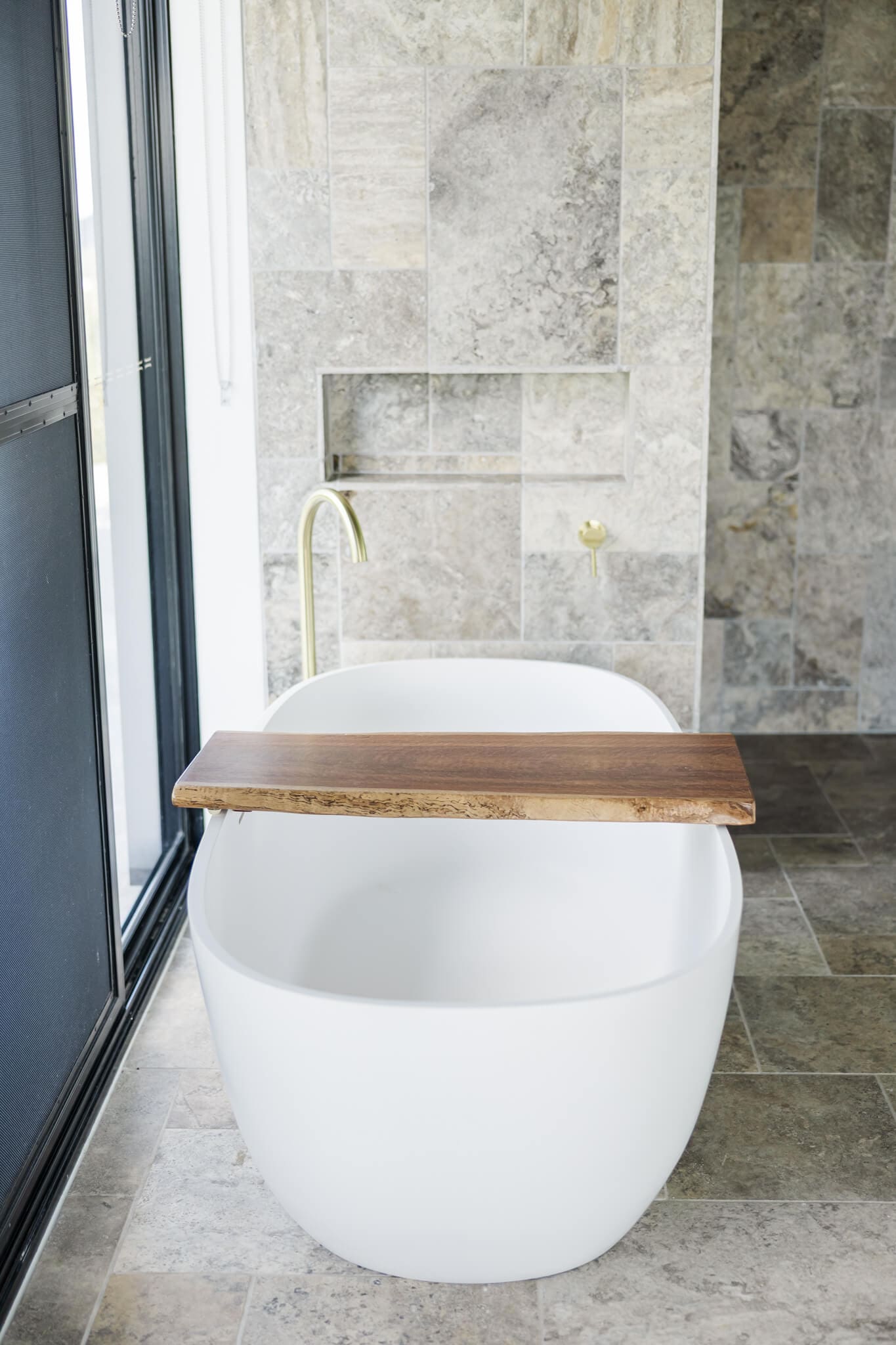 Freestanding bath tub in the honeymoon suite at Ambrym Estate, Yeppoon, Queensland.