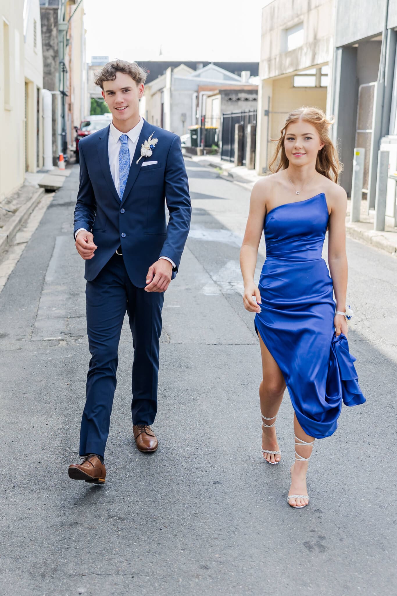 Candid photo of formal graduates in their formal dress Rockhampton, Quay Lane.