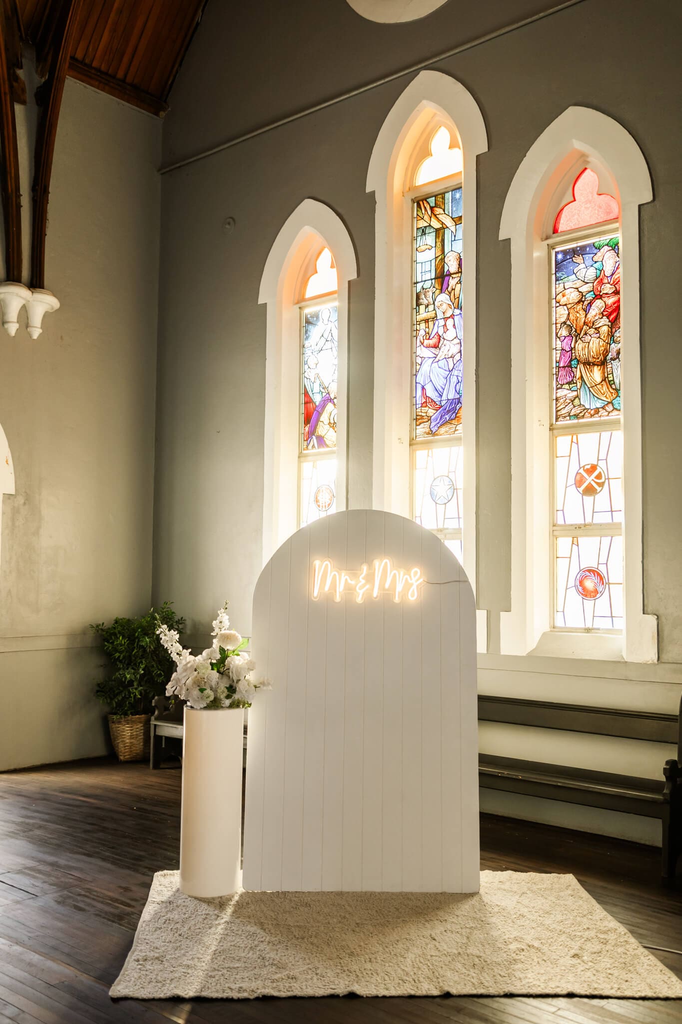 Wedding photo area set up at reception, by Little List Co.