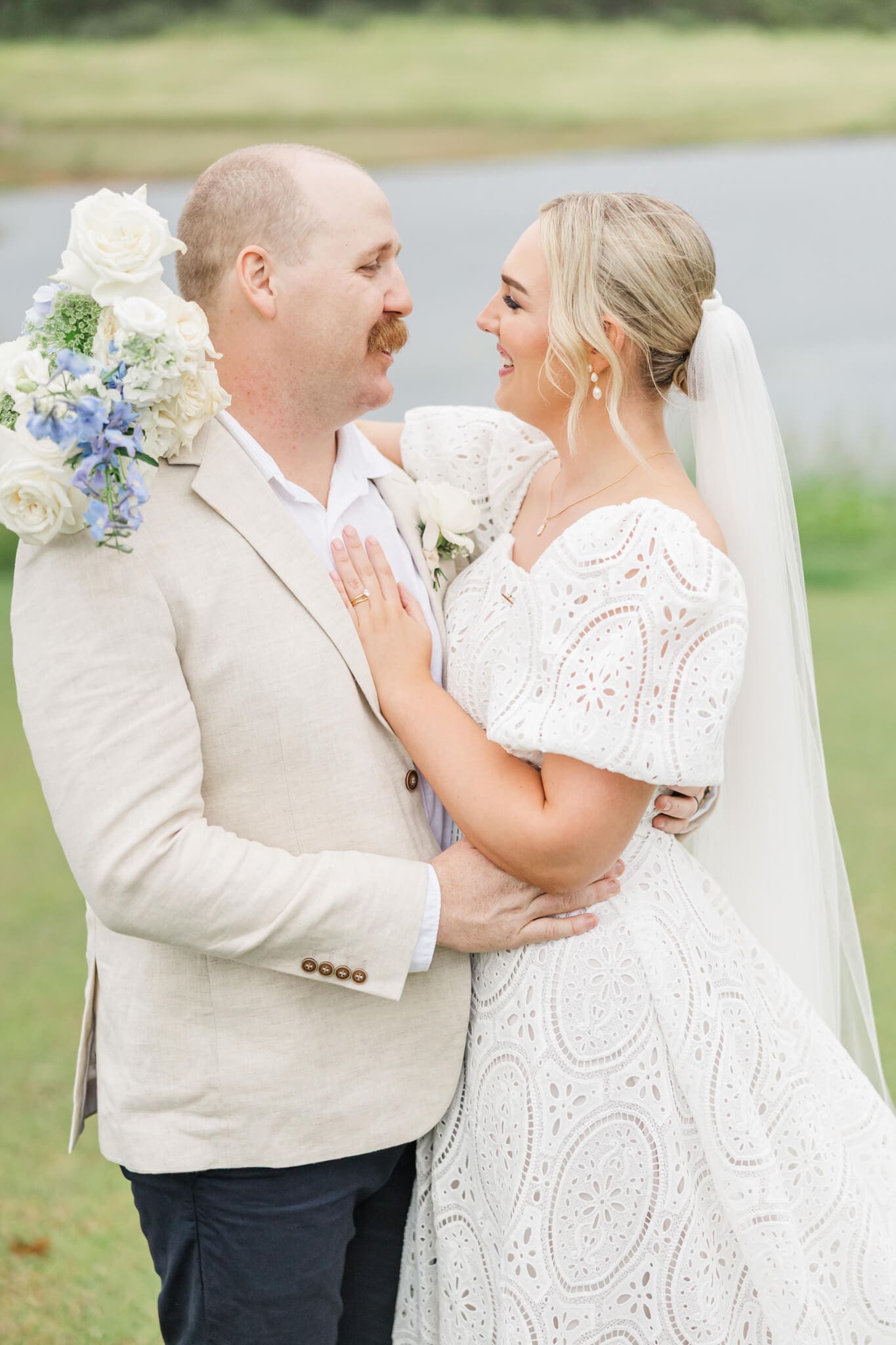 Bride and Groom sharing a moment for the camera. Taken near Yeppoon by Julie-Anne Photography
