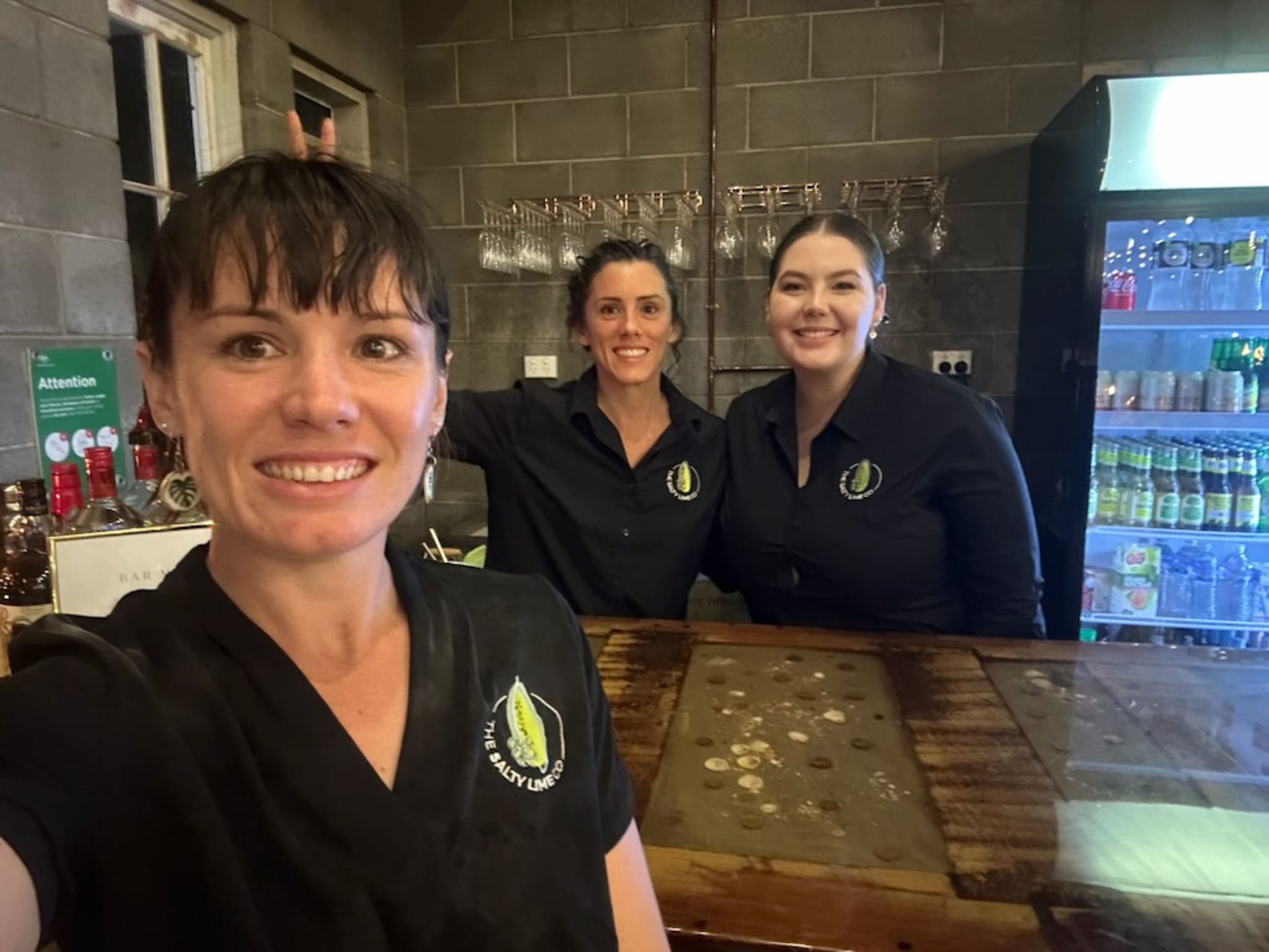 Team for the Salty Lime smiling at camera.