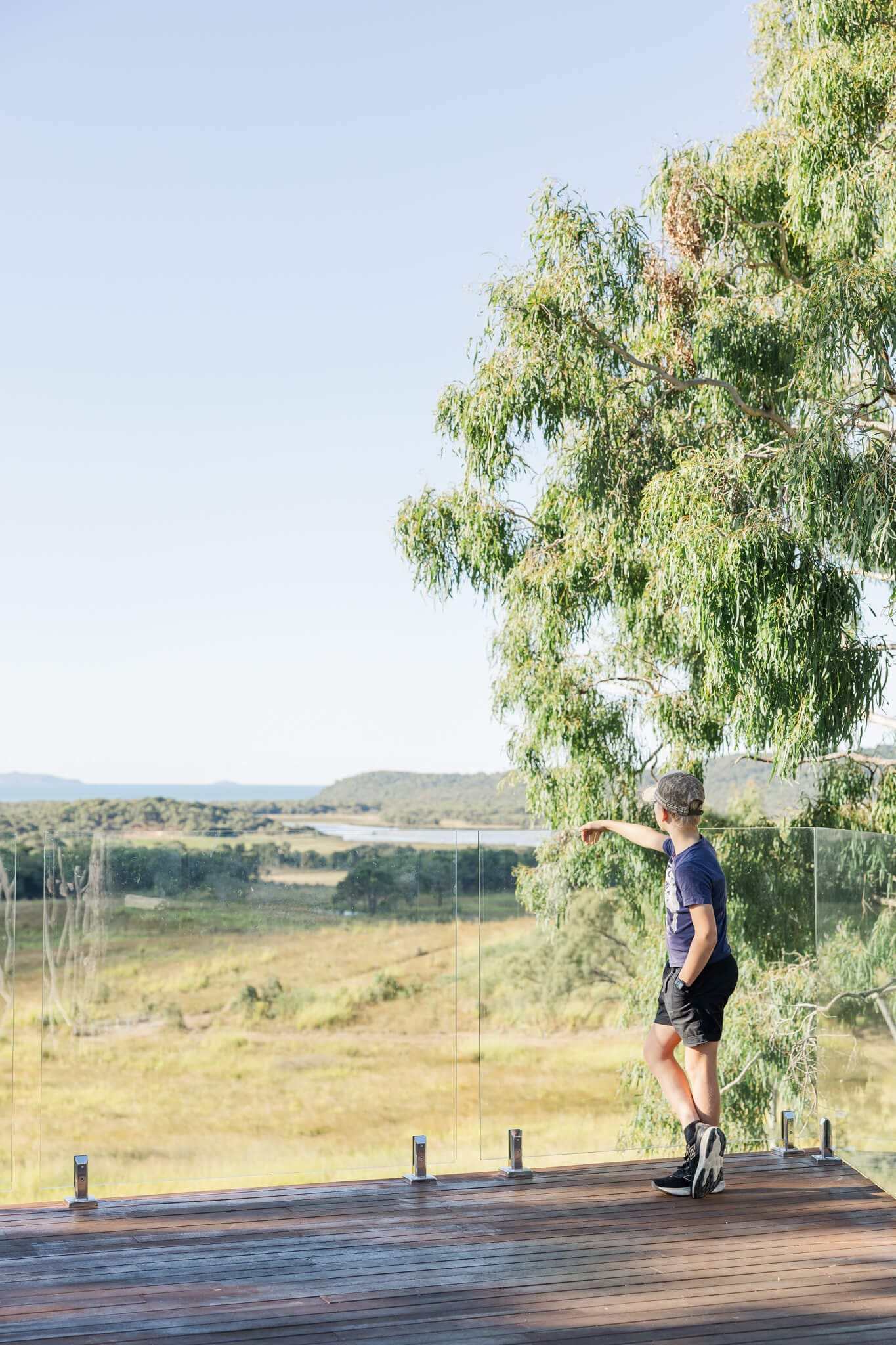 Boy looking at the view at the Salty Lime Co Ceremony Hill.