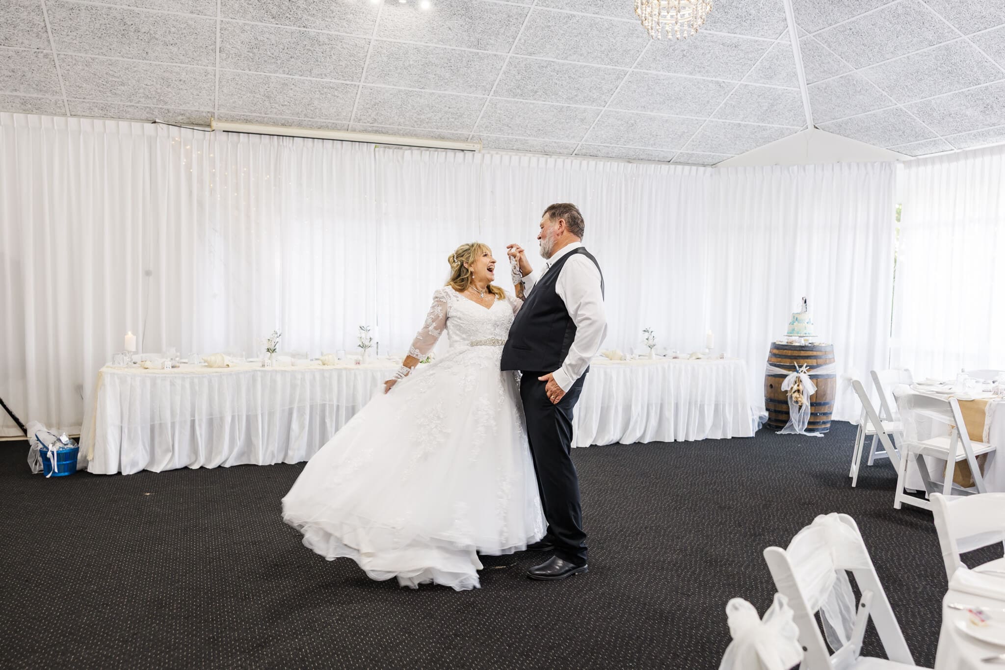 Bride and Groom dance at their wedding reception at Beaches Restaurant Yeppoon. 
