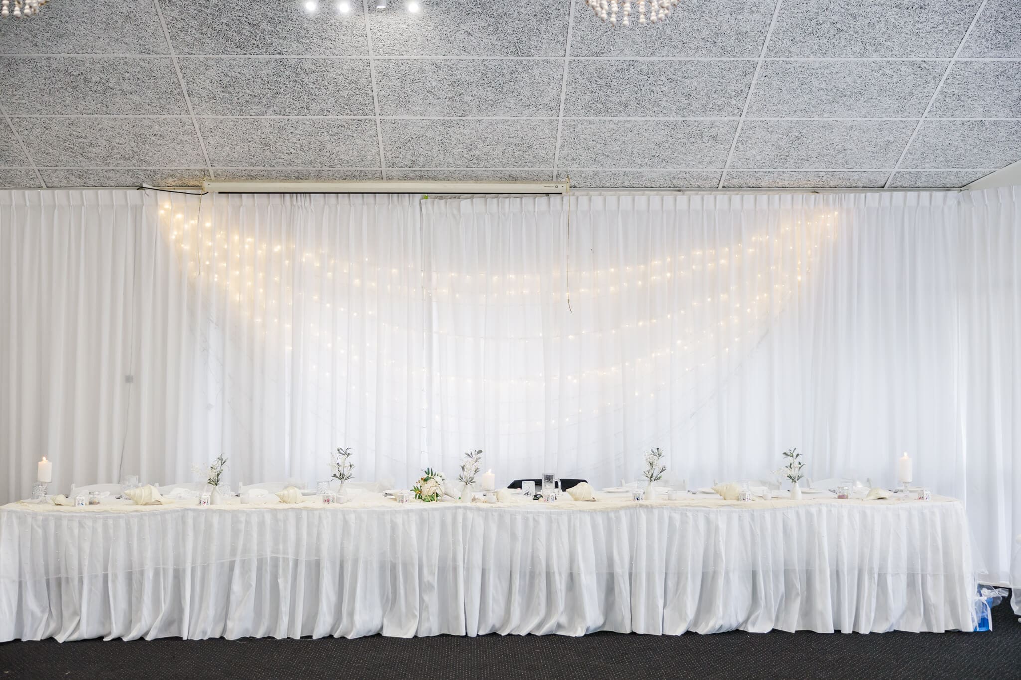 Wedding reception set up at Beaches Restaurant Yeppoon. Bride and Groom's table.