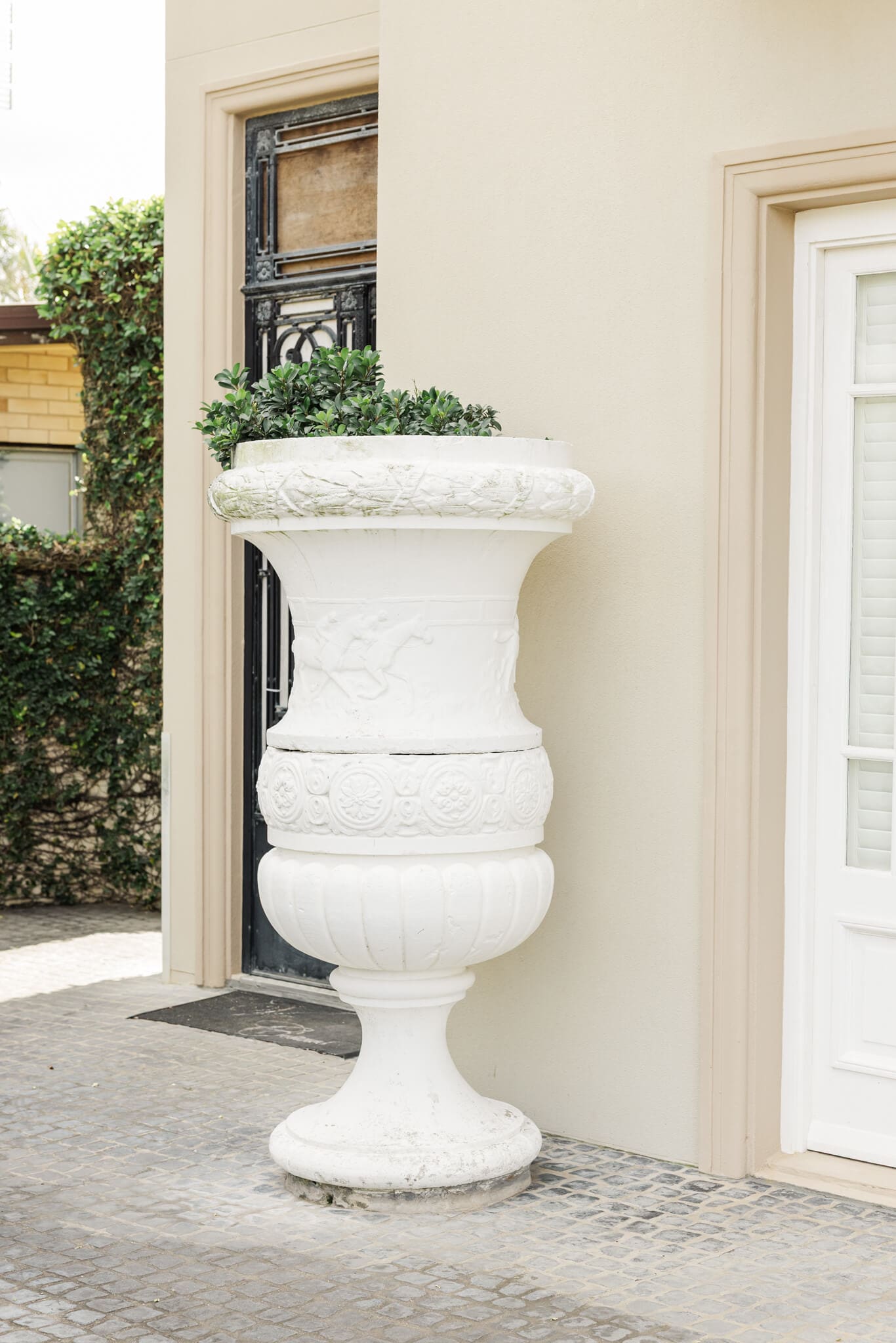Outside a stunning wedding venue, featuring beautiful and elegant architecture. Located at Cooee Bay, Queensland, Australia