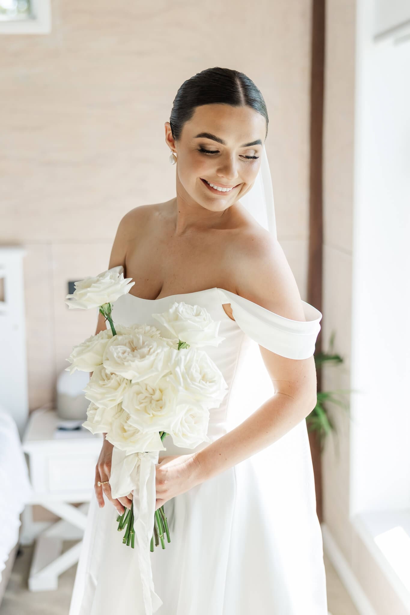 Stunning bride prepares for her wedding day, in the Hilltop Chalet at The Woodbury Lookout wedding venue near Yeppoon. Captured by Julie-Anne Photography.