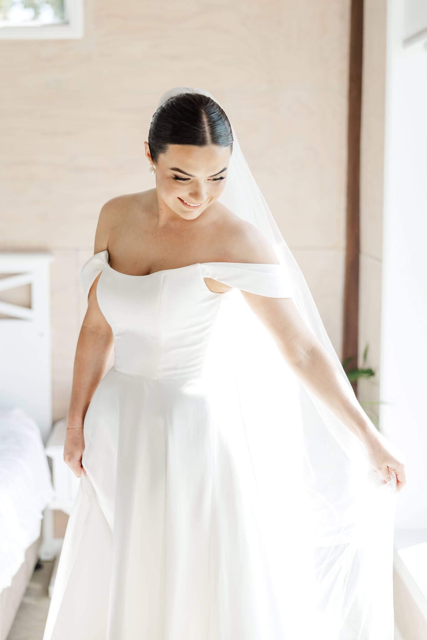 Stunning bride prepares for her wedding day, in the Hilltop Chalet at The Woodbury Lookout wedding venue near Yeppoon. Captured by Julie-Anne Photography.