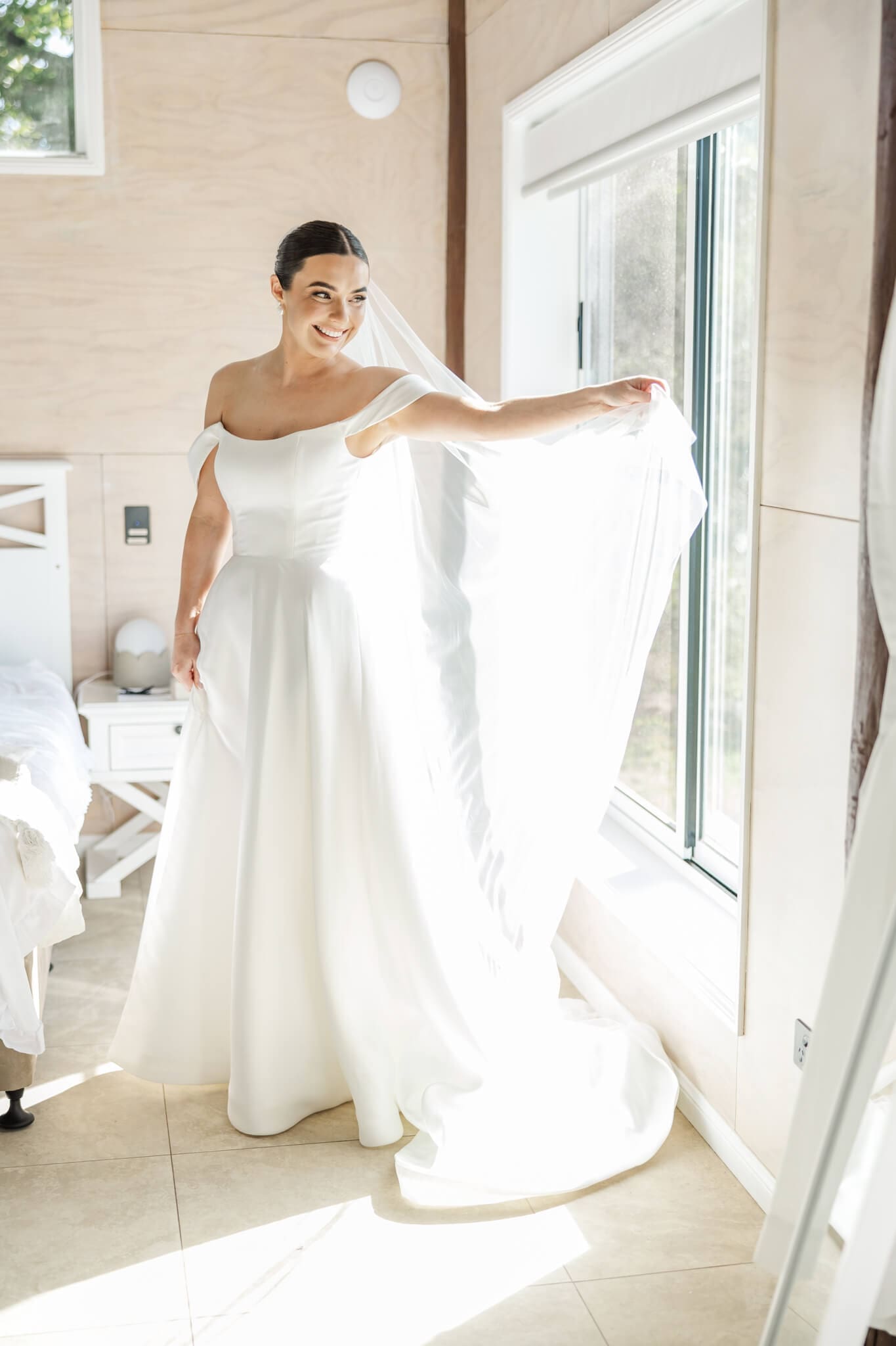Stunning bride prepares for her wedding day, in the Hilltop Chalet at The Woodbury Lookout wedding venue near Yeppoon. Captured by Julie-Anne Photography.