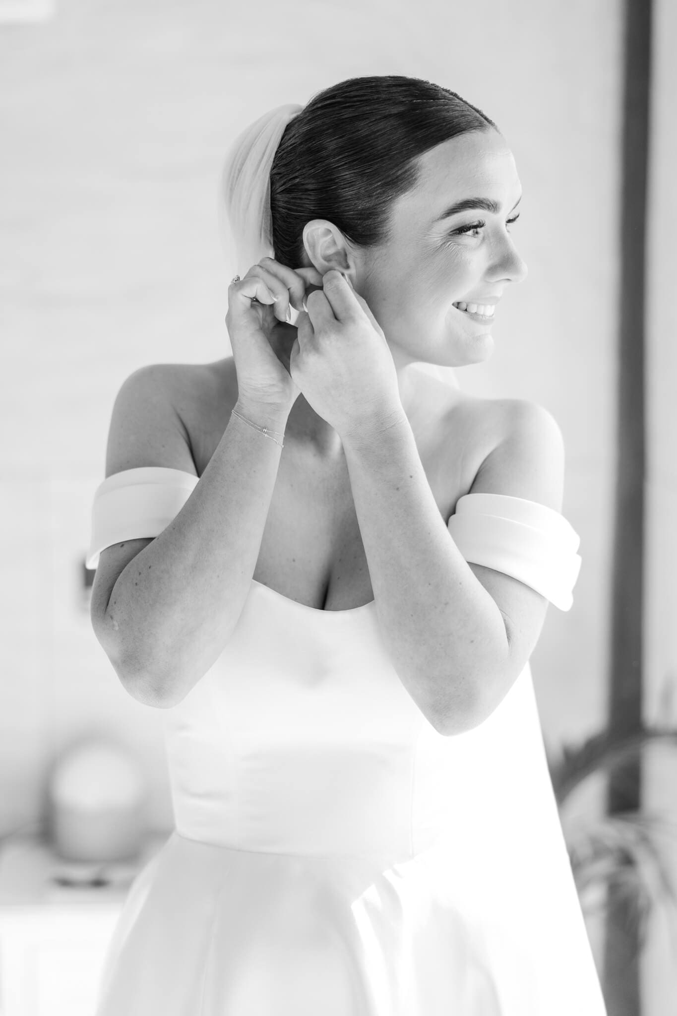 Stunning bride prepares for her wedding day, in the Hilltop Chalet at The Woodbury Lookout wedding venue near Yeppoon. Captured by Julie-Anne Photography.
