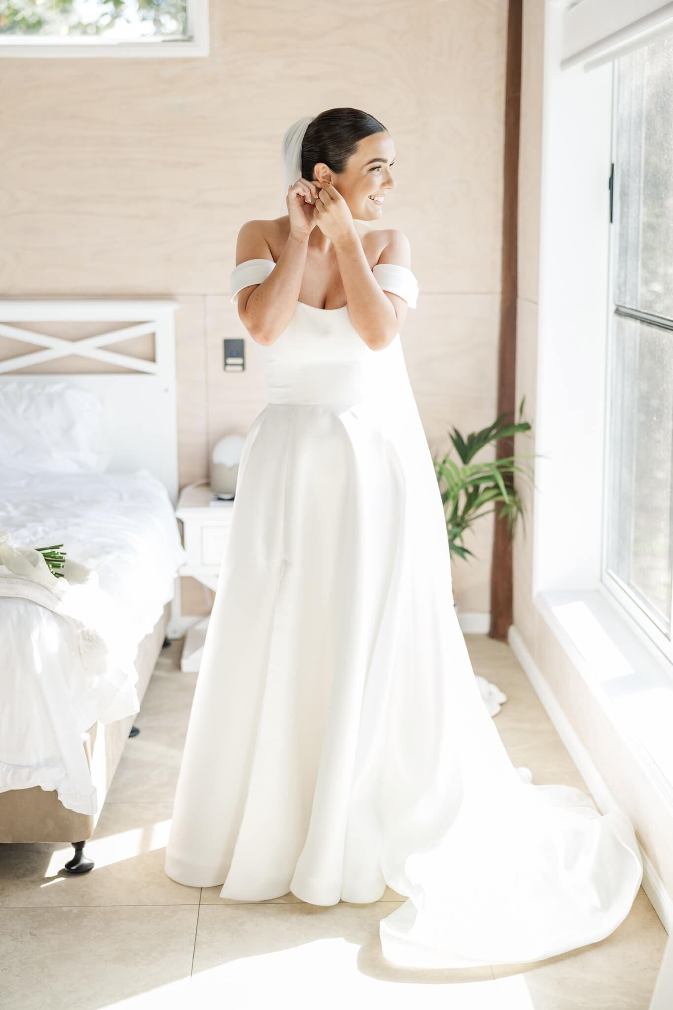 Stunning bride prepares for her wedding day, in the Hilltop Chalet at The Woodbury Lookout wedding venue near Yeppoon. Captured by Julie-Anne Photography.