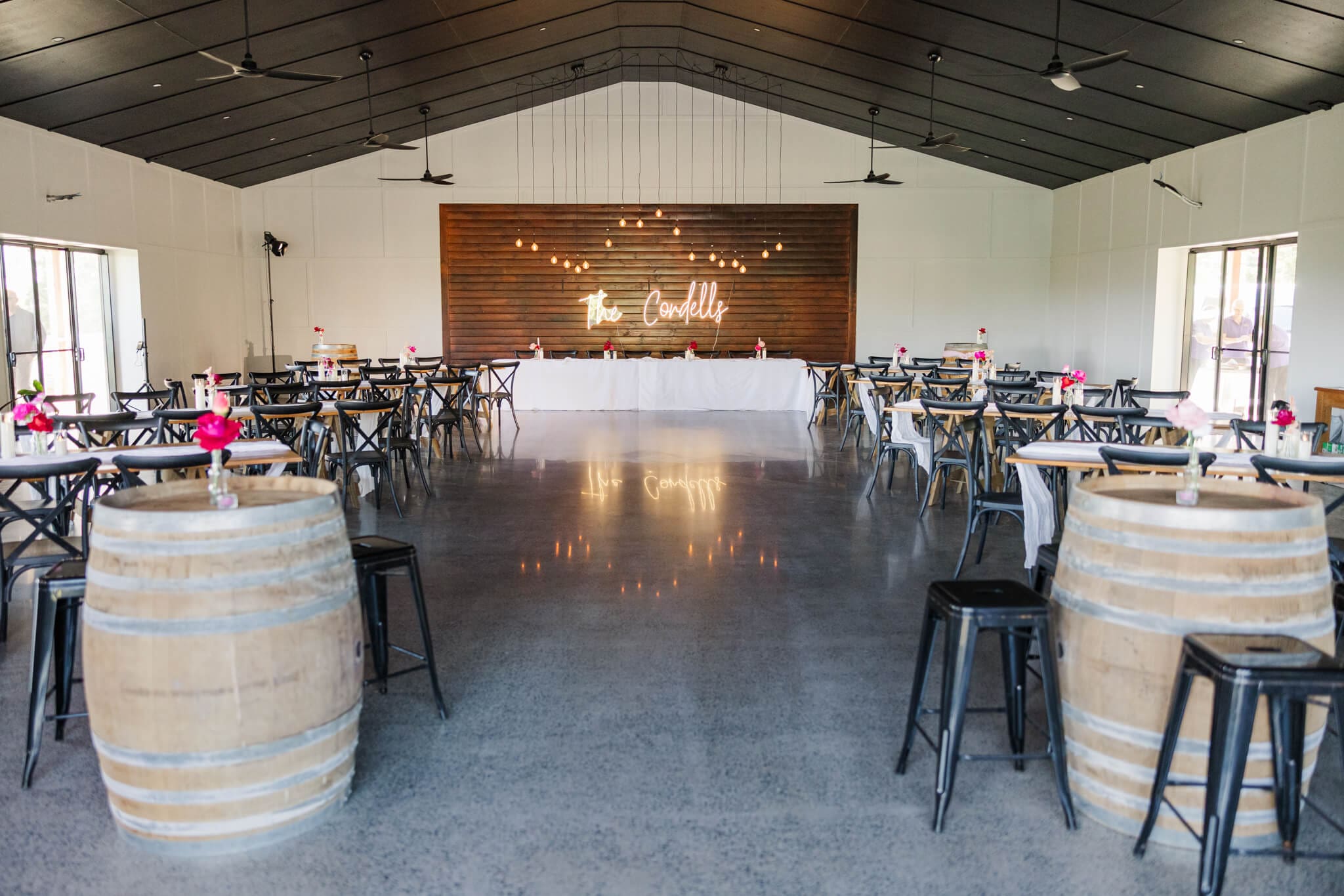 Inside the venue at The Orchard Yeppoon, looking over a set up wedding reception. Captured by local photographer, Julie-Anne Photography.
