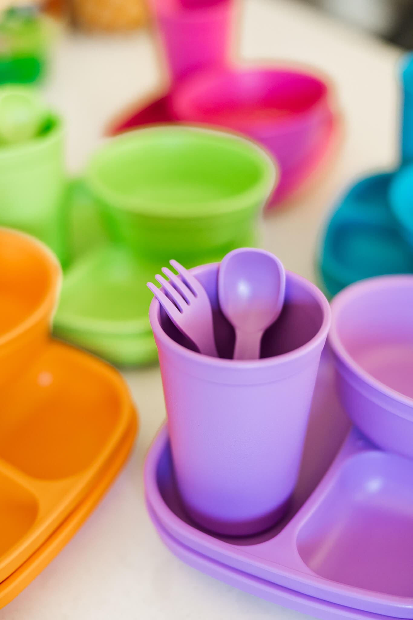 Colourful tableware designed for toddlers, sold at Two Little Finches.