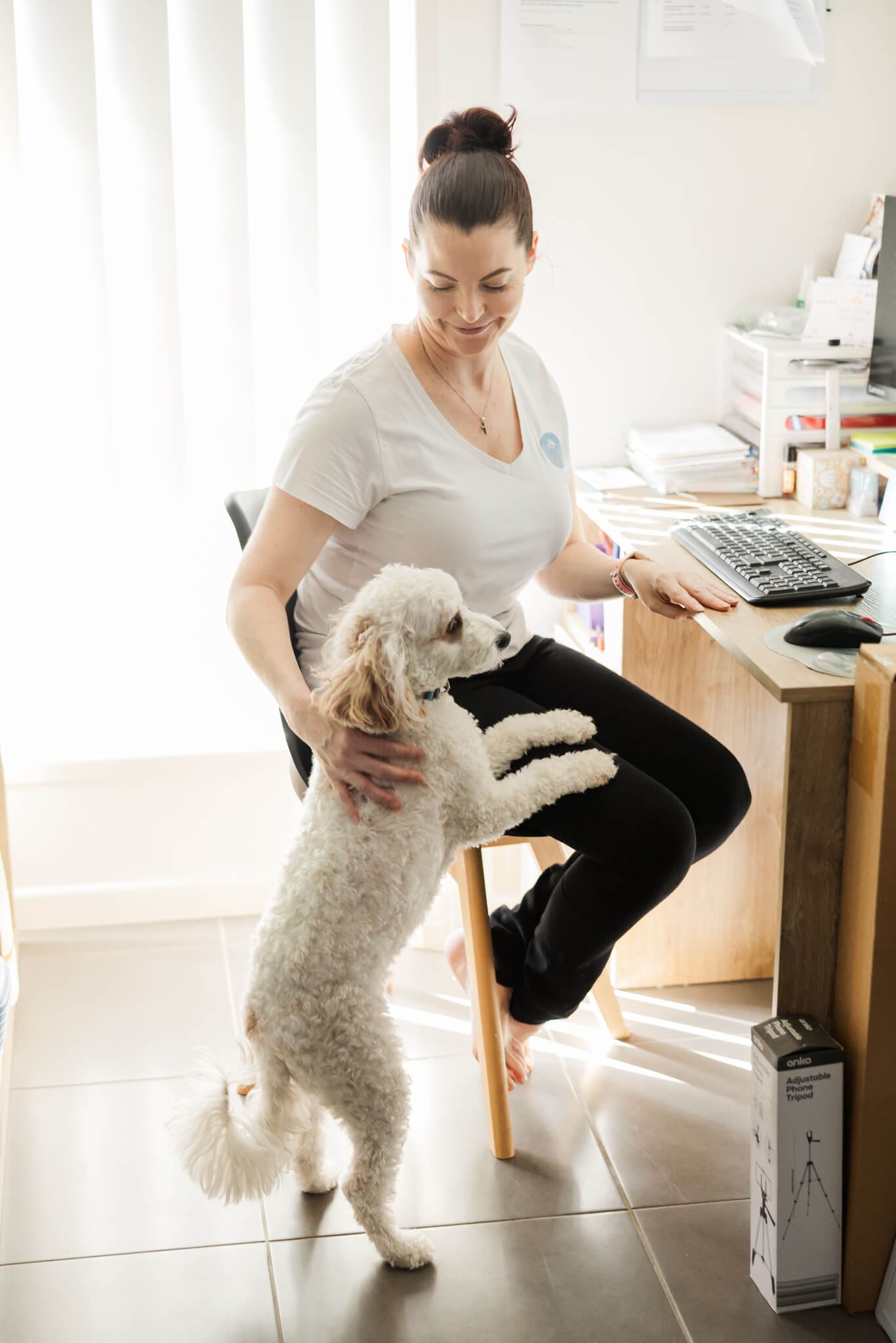 Jess from Two Little Finches, mum and business owner at her office desk
