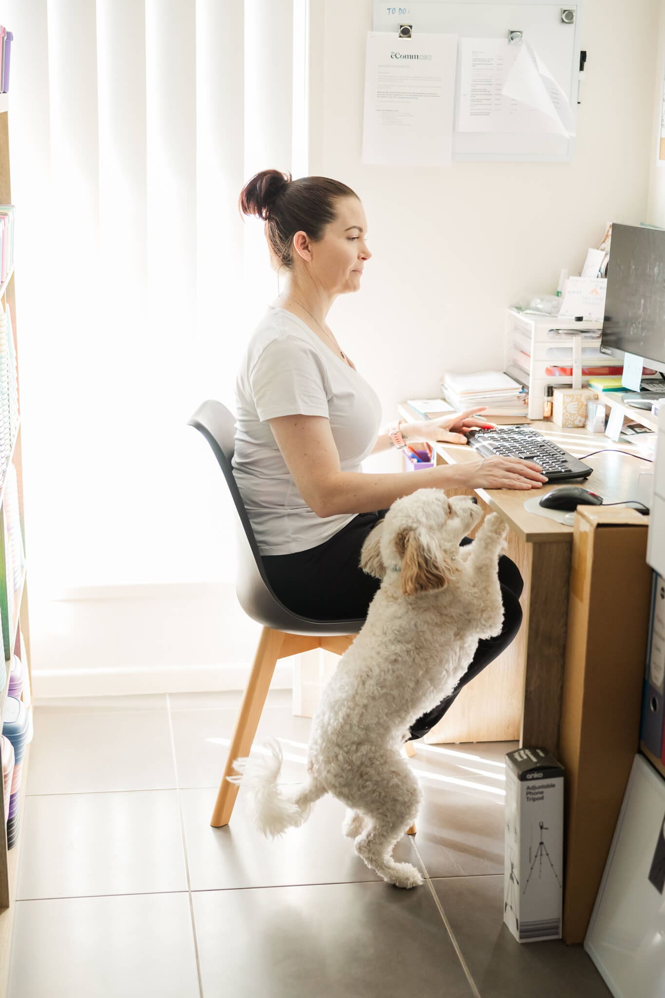 Jess from Two Little Finches, mum and business owner at her office desk