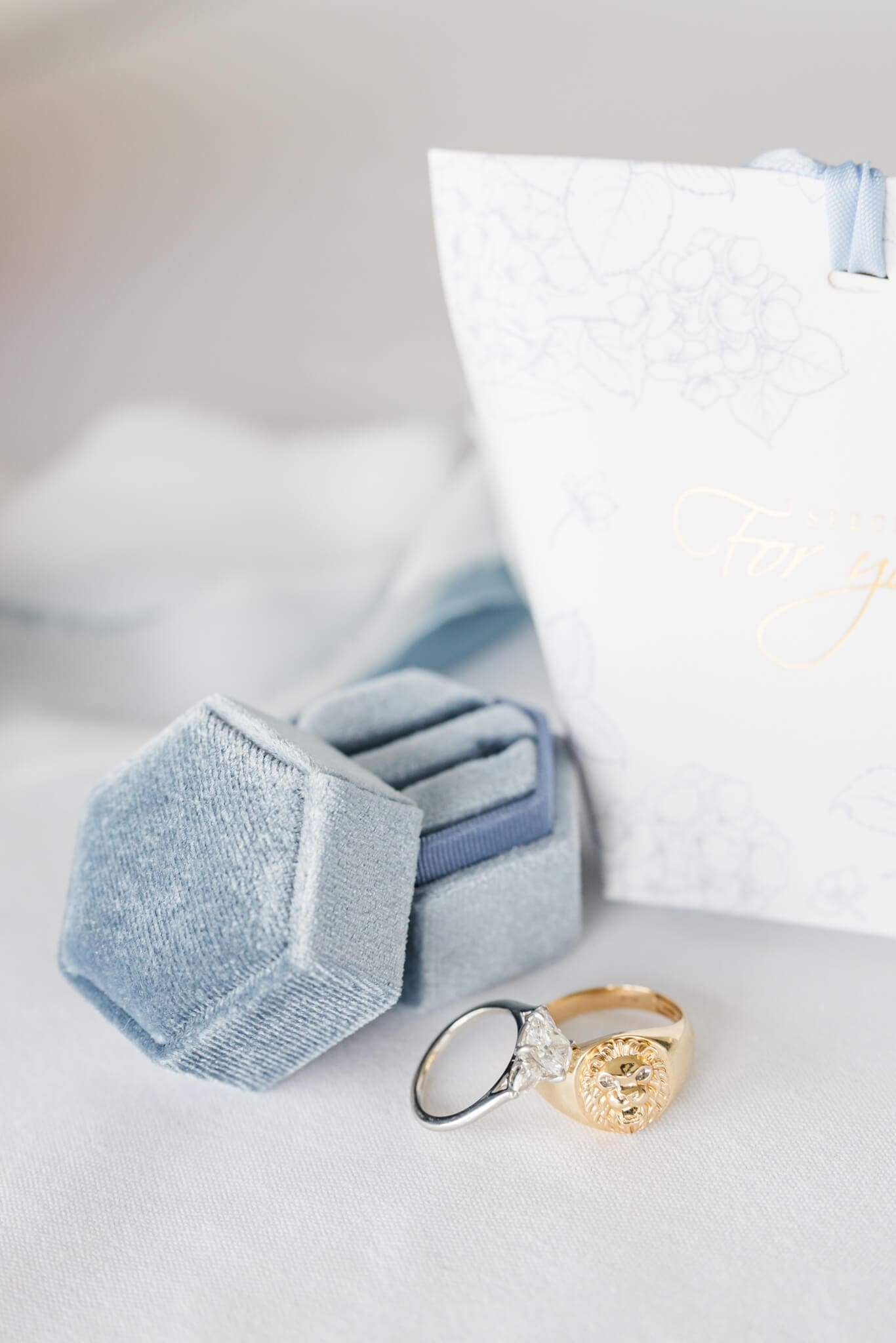 Detail shot of bride and grooms rings on their wedding day.
