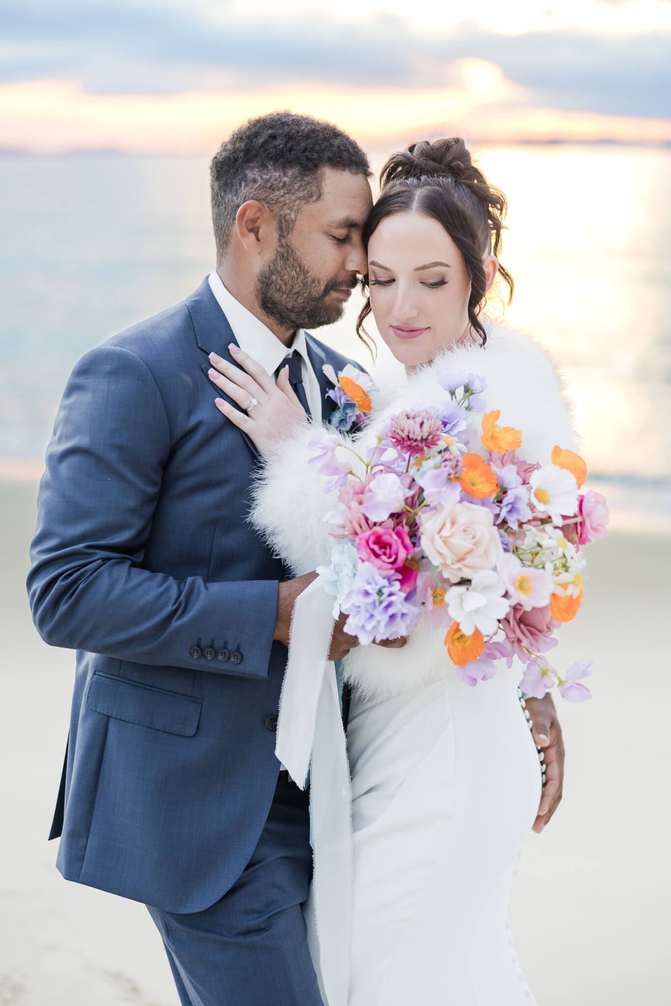 Bride and Groom share a moment on Great Keppel Island during their wedding day. Pictured in front of one of the beaches near Great Keppel Island Hideaway.
