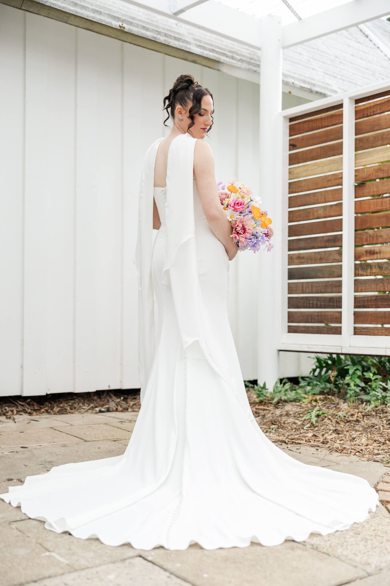 Bride poses before her ceremony on Great Keppel Island. Photographed by Yeppoon photographer, Julie-Anne Photography.