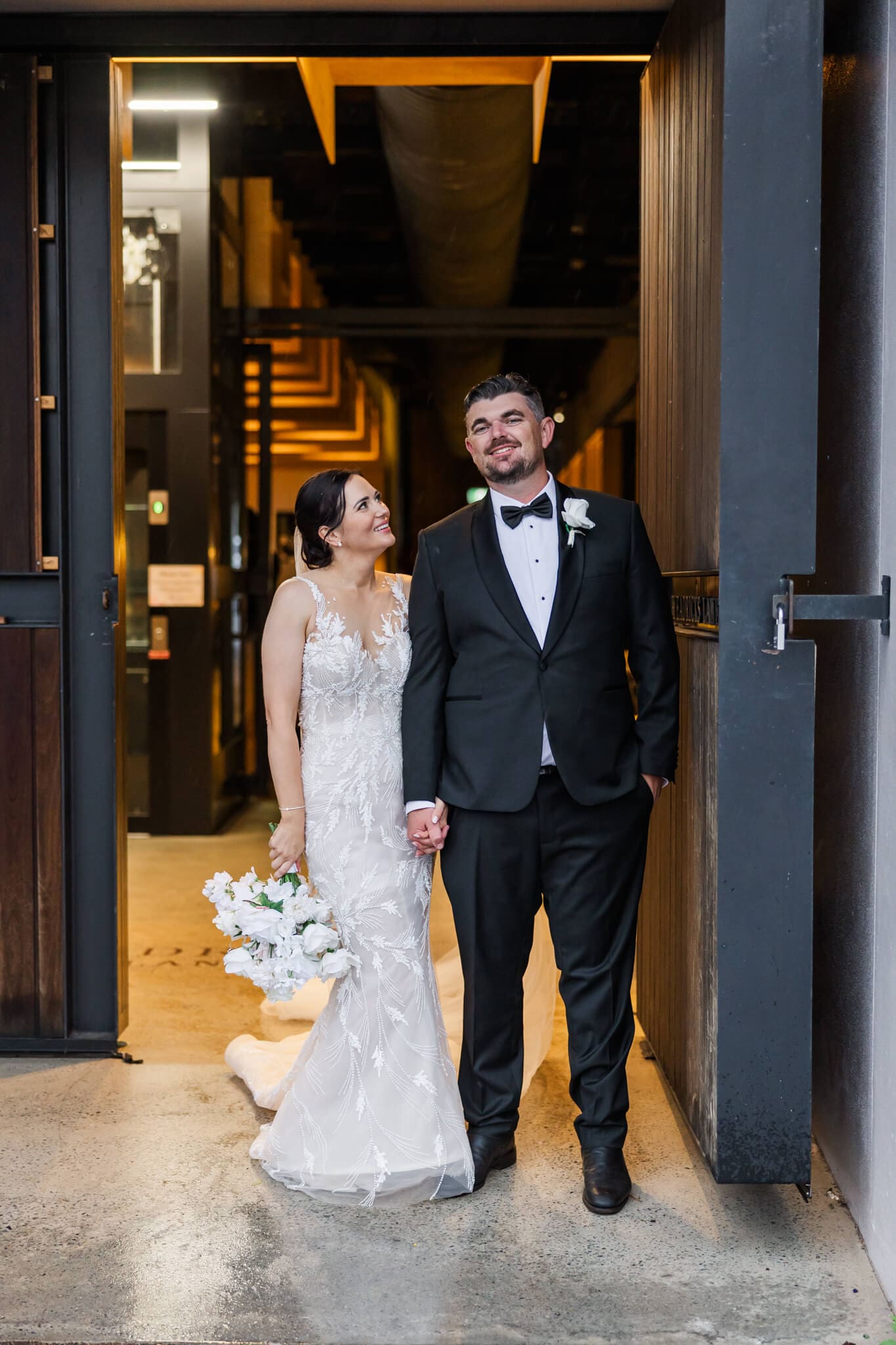 Bride and groom share a moment at their wedding venue, Headricks Lane before entering for their wedding reception.