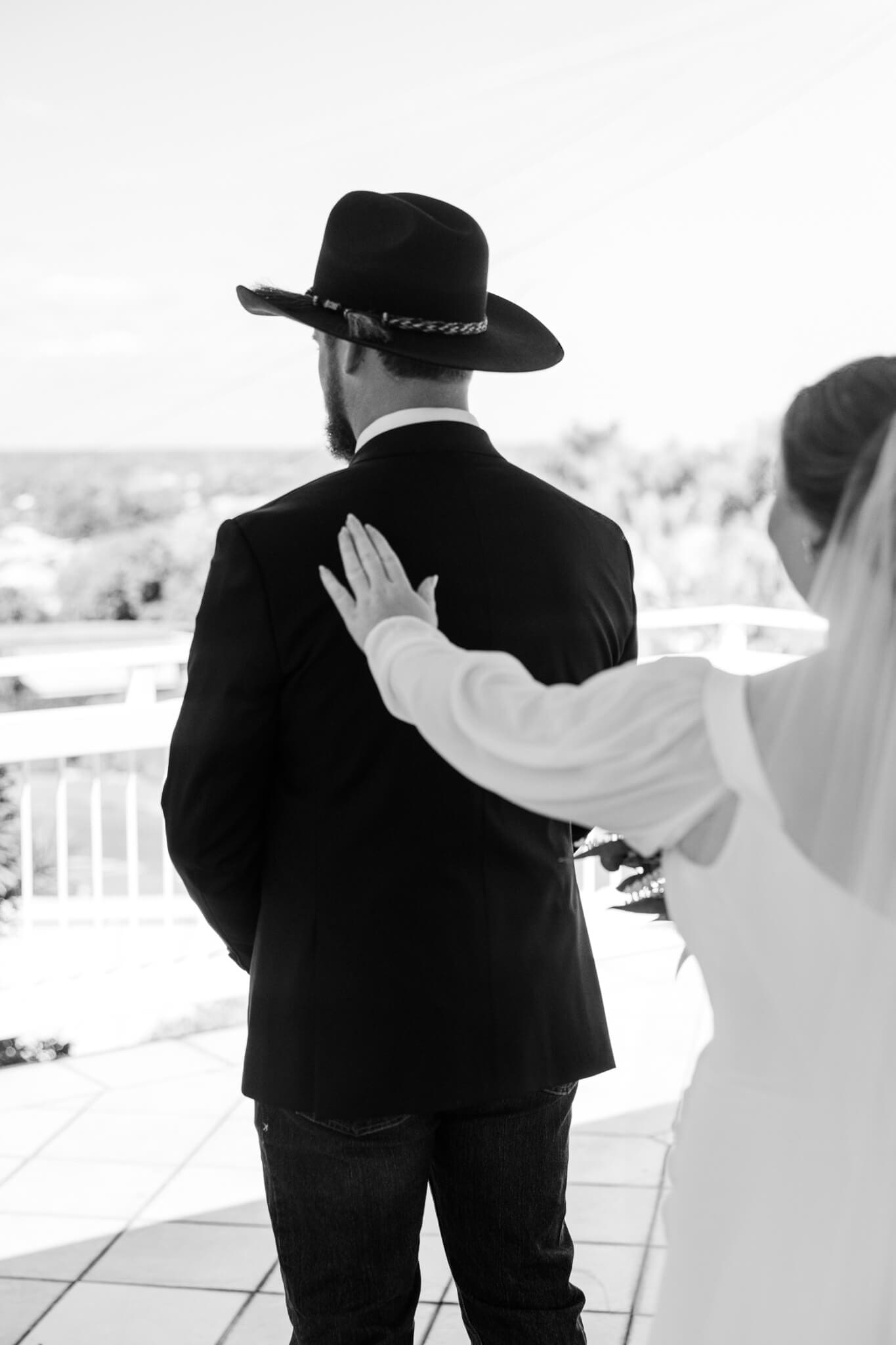 First look for a bride and groom in a luxury Airbnb before they go to their wedding ceremony site at Paradise Lagoons Rockhampton.