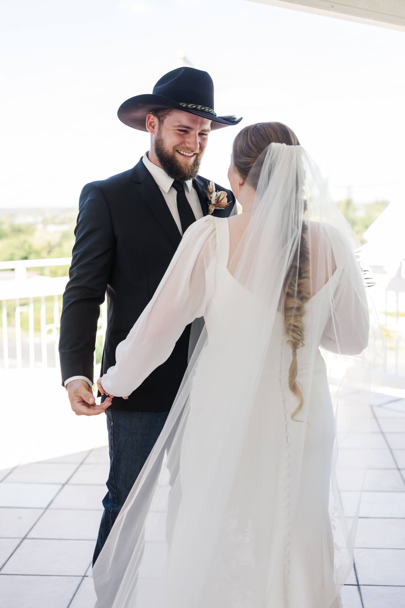 First look for a bride and groom in a luxury Airbnb before they go to their wedding ceremony site at Paradise Lagoons Rockhampton.