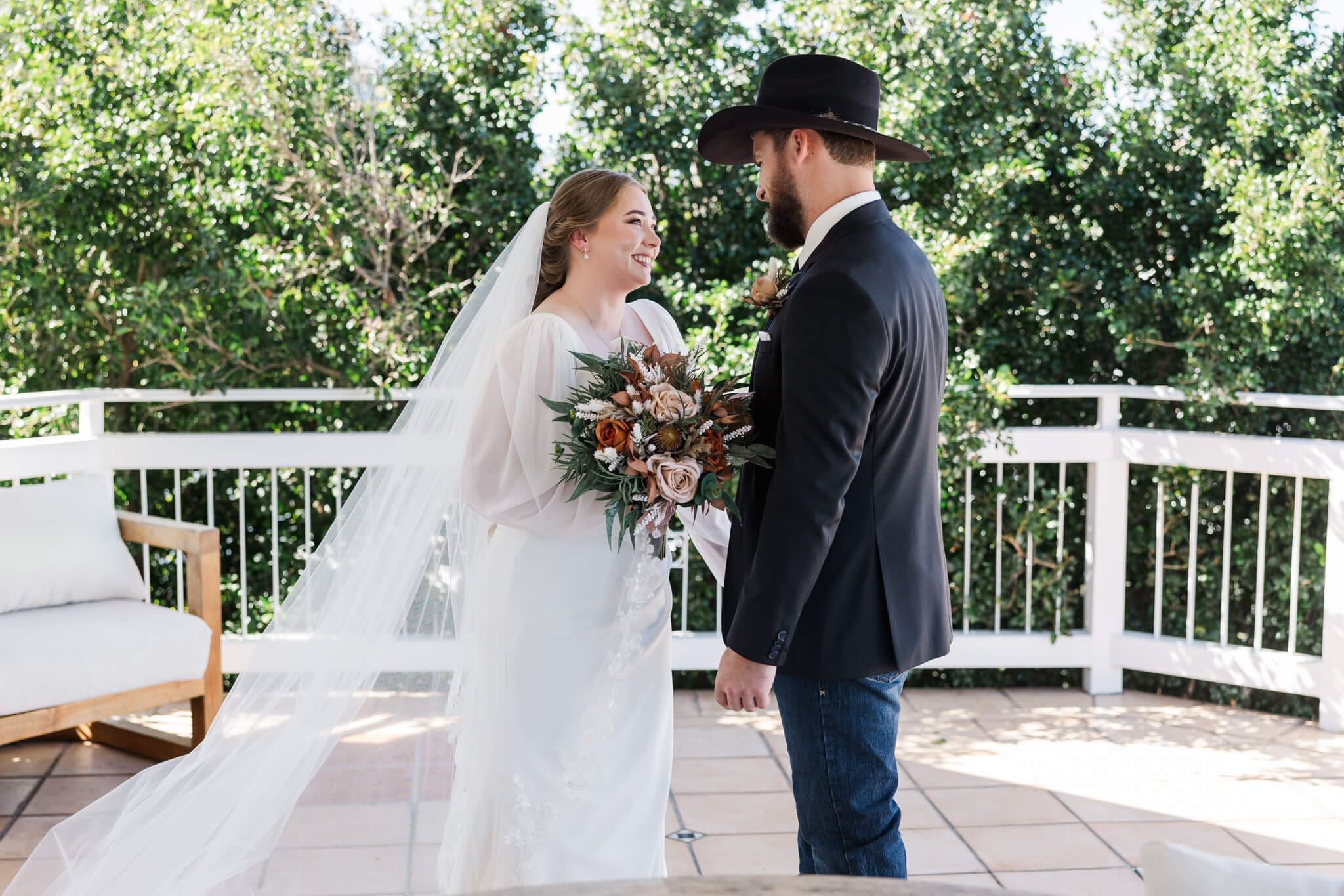 First look for a bride and groom in a luxury Airbnb before they go to their wedding ceremony site at Paradise Lagoons Rockhampton.