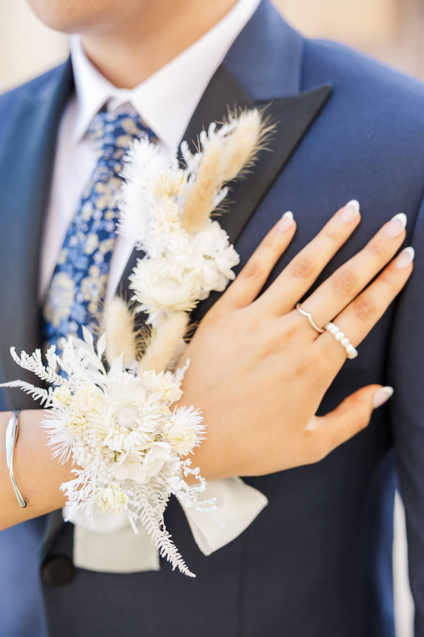 A beautiful floral hand piece created by Shannon Hawkes Rockhampton on a graduate for her formal day.