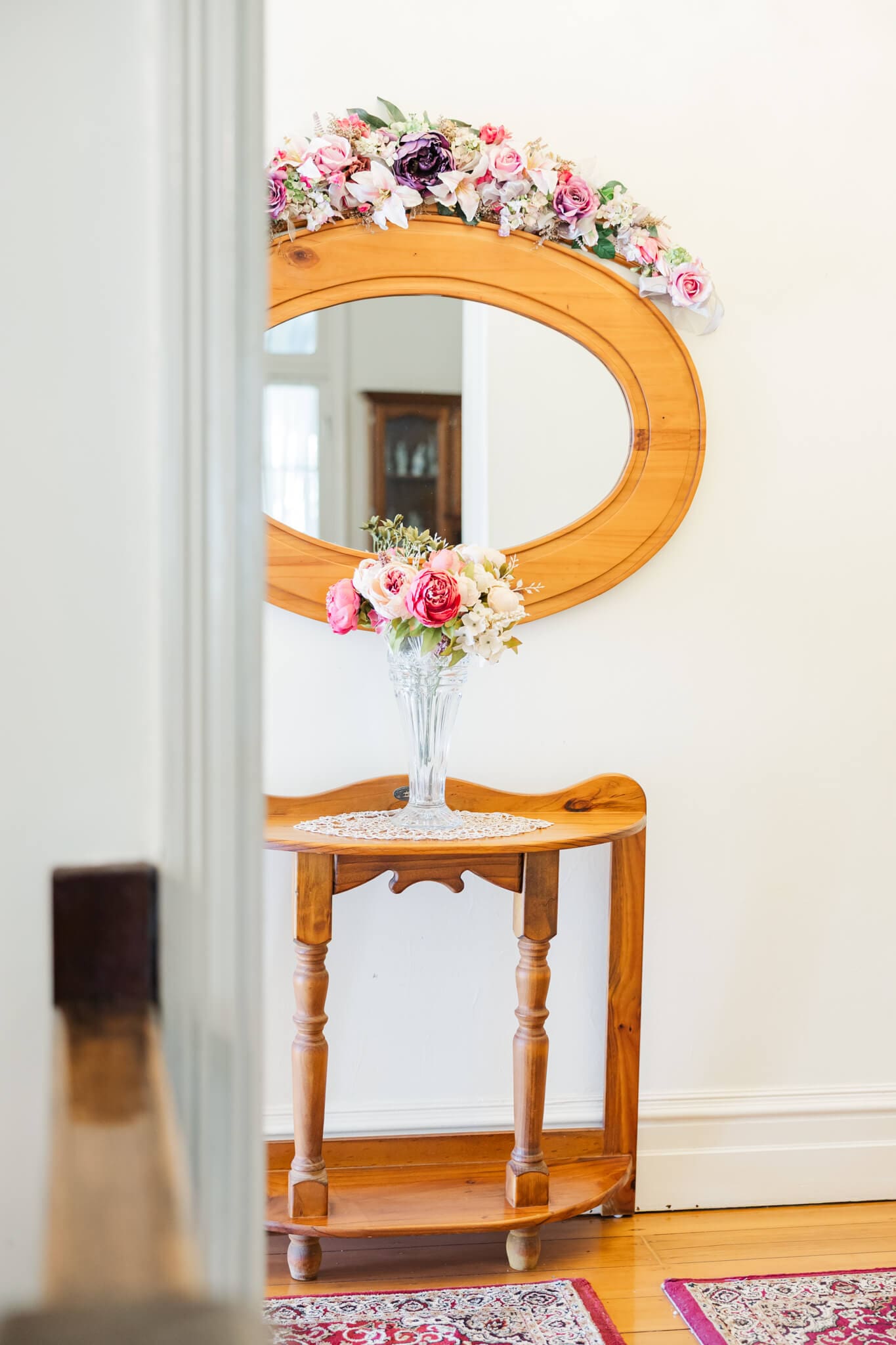 Gorgeous flower arrangement in the main hall of a Rockhampton wedding venue, Queensland. Captured by Julie-Anne Photography.