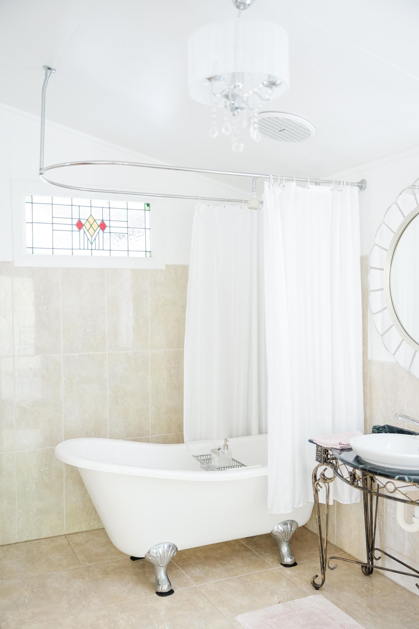 The free standing bath tub inside the main homestead within St Aubins Village