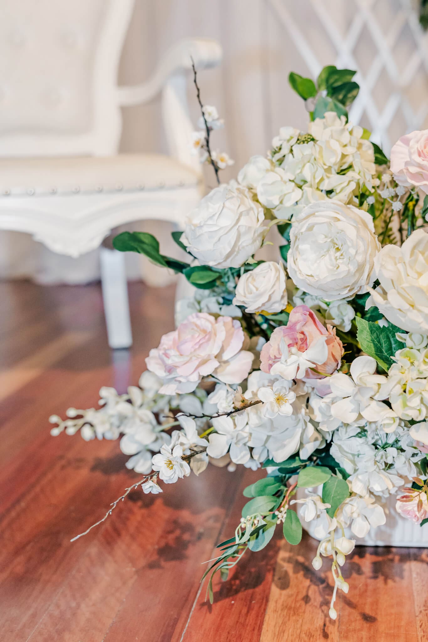 Stunning floral shot taken of the styling by Stylish Events and Hire. Colours include white, cream, pink and green leaves.
