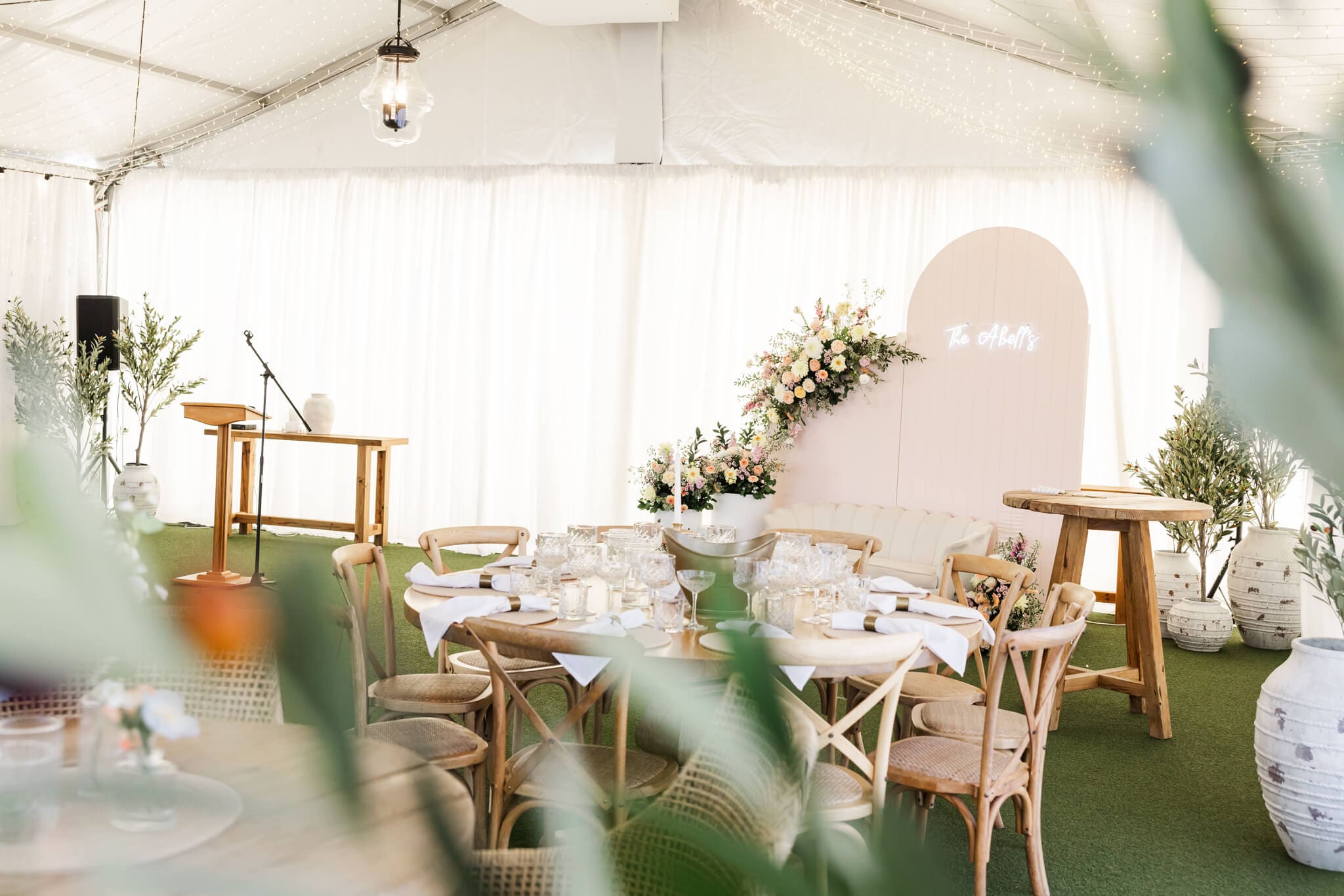 Capturing the wedding reception area in the style of editorial wedding photography style.