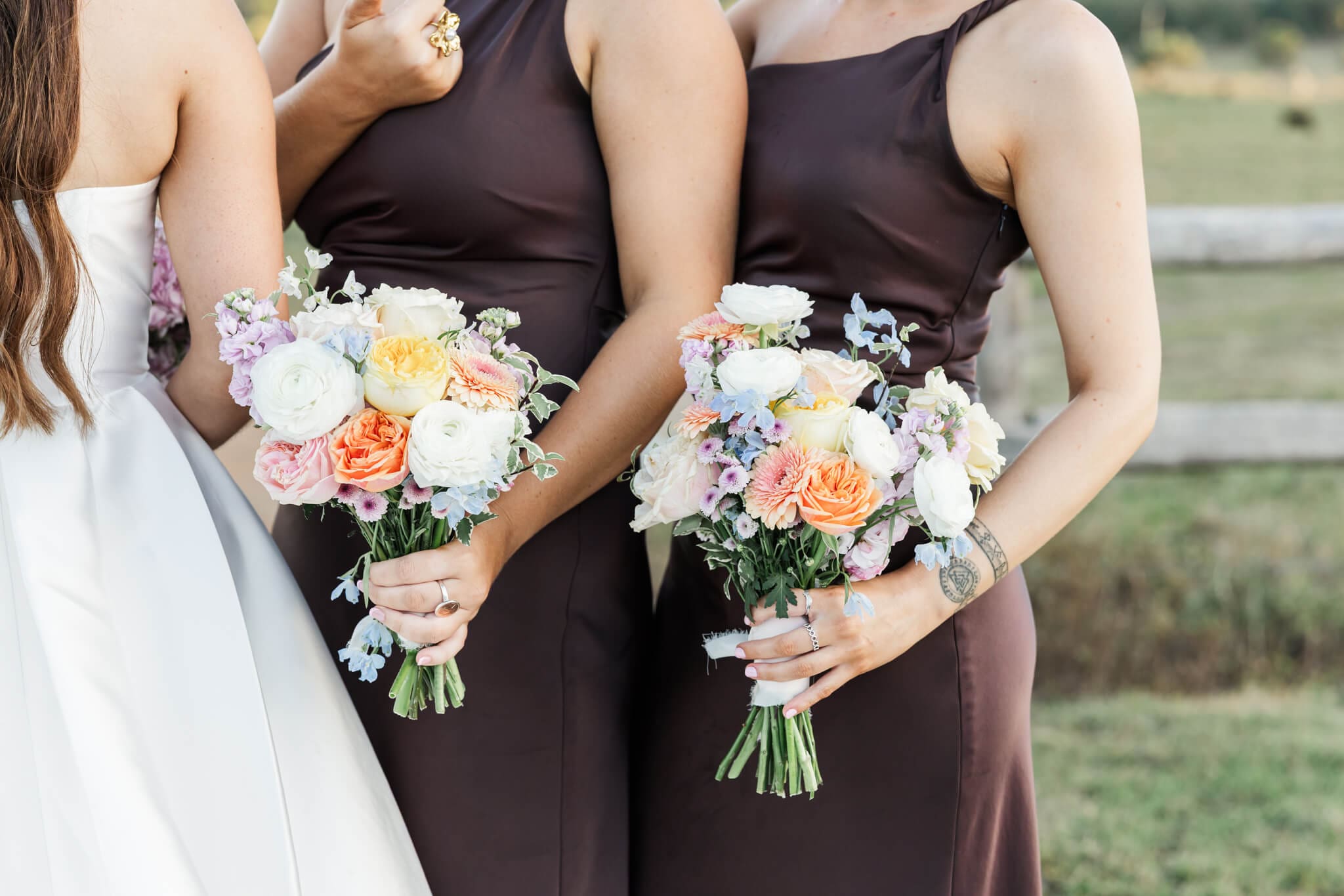 Close up photo of the bridesmaids bouquets that are made up of gorgeous pastel colours.