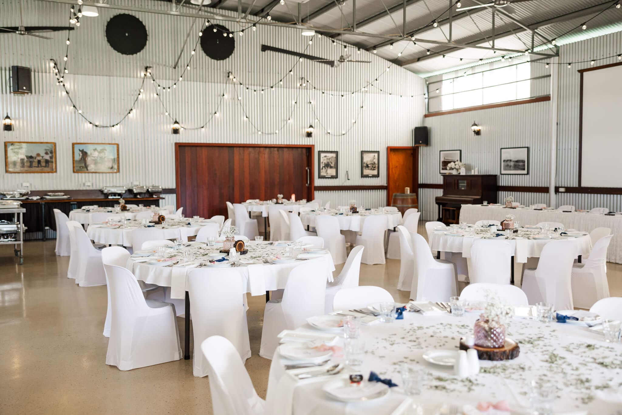 The hanger at The Old Station Raglan, featuring a wedding reception styled beautifully and ready for the happy couple.