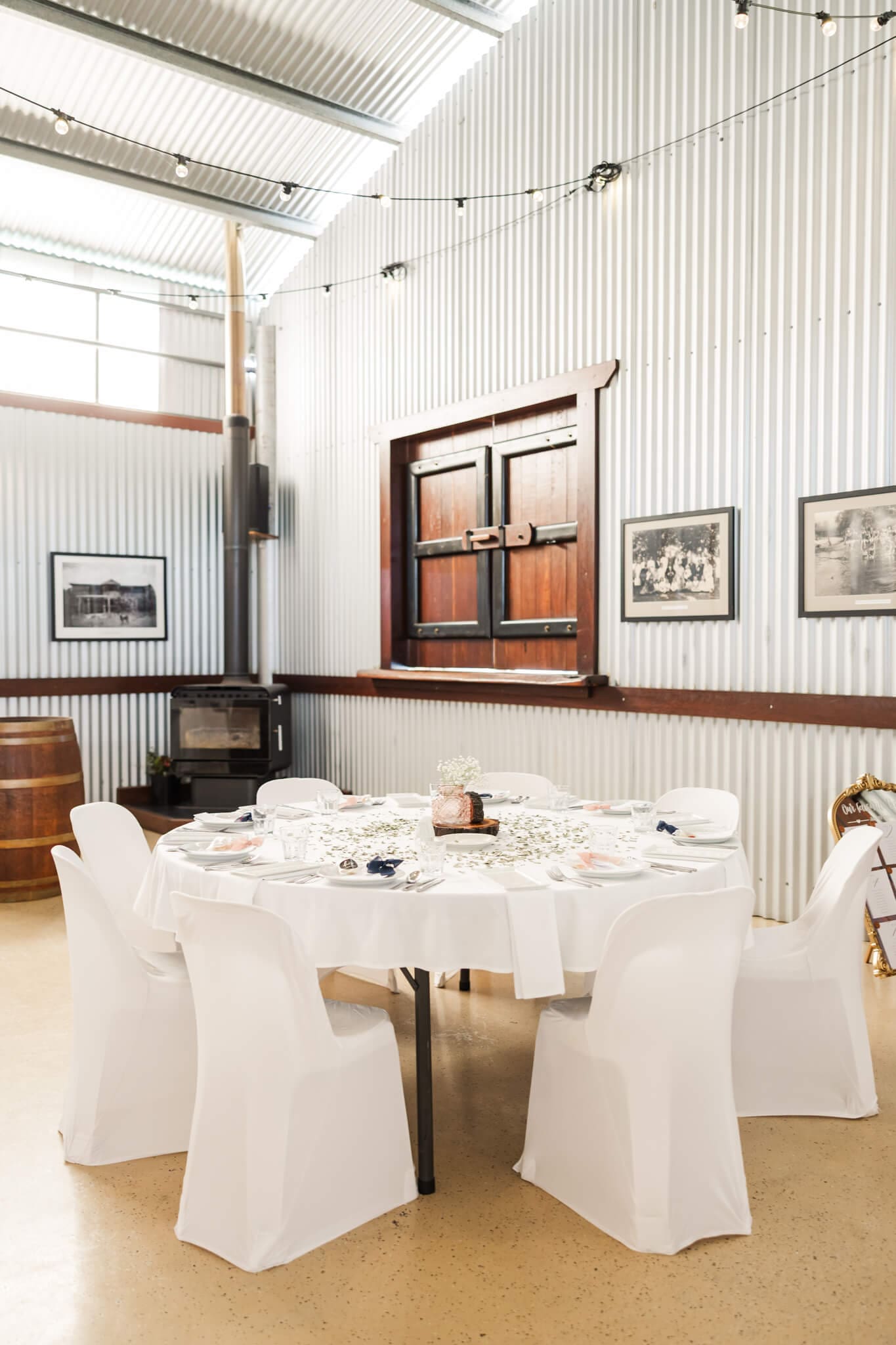 The hanger at The Old Station Raglan, featuring a wedding reception styled beautifully and ready for the happy couple.