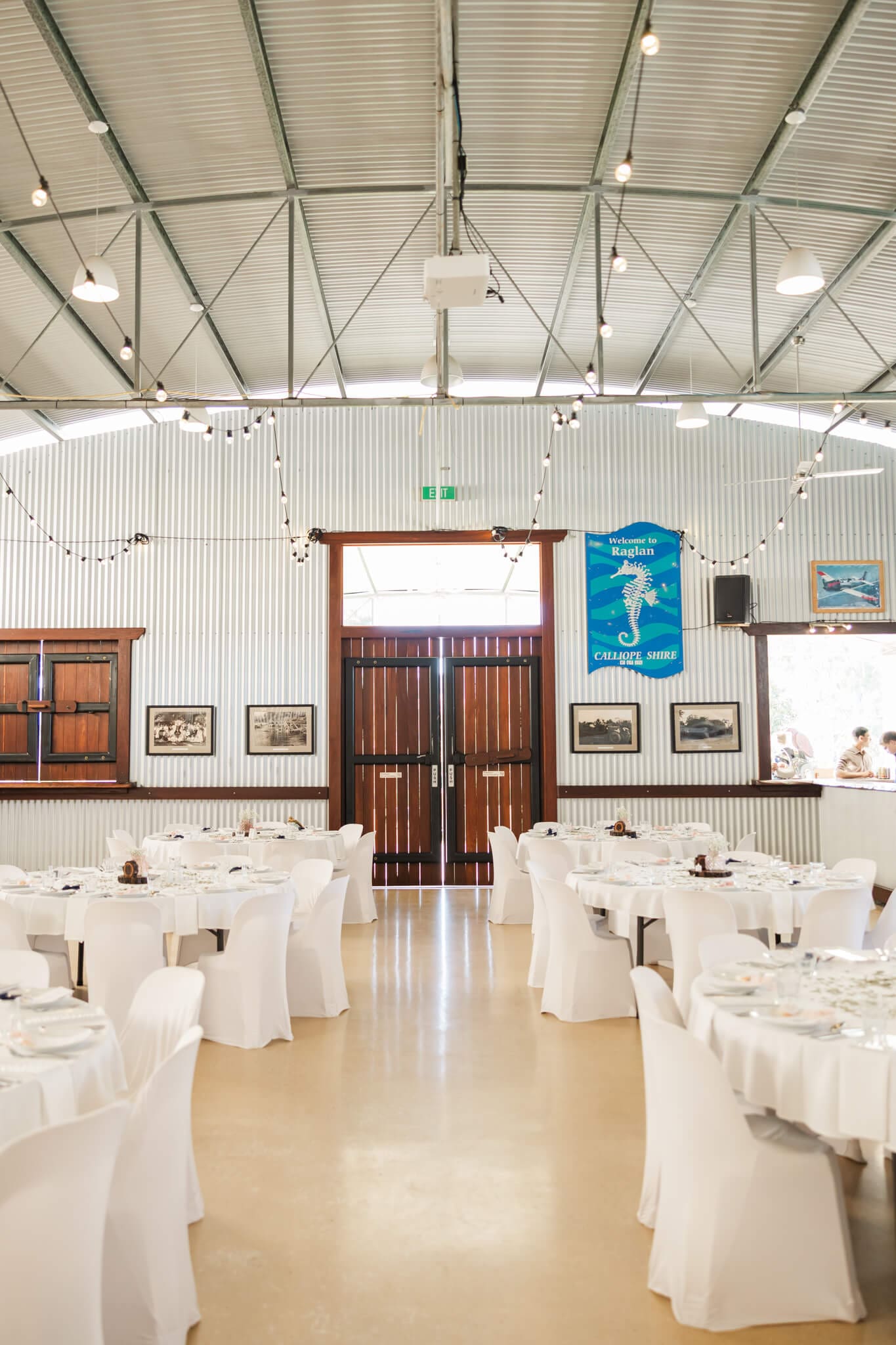 The hanger at The Old Station Raglan, featuring a wedding reception styled beautifully and ready for the happy couple.