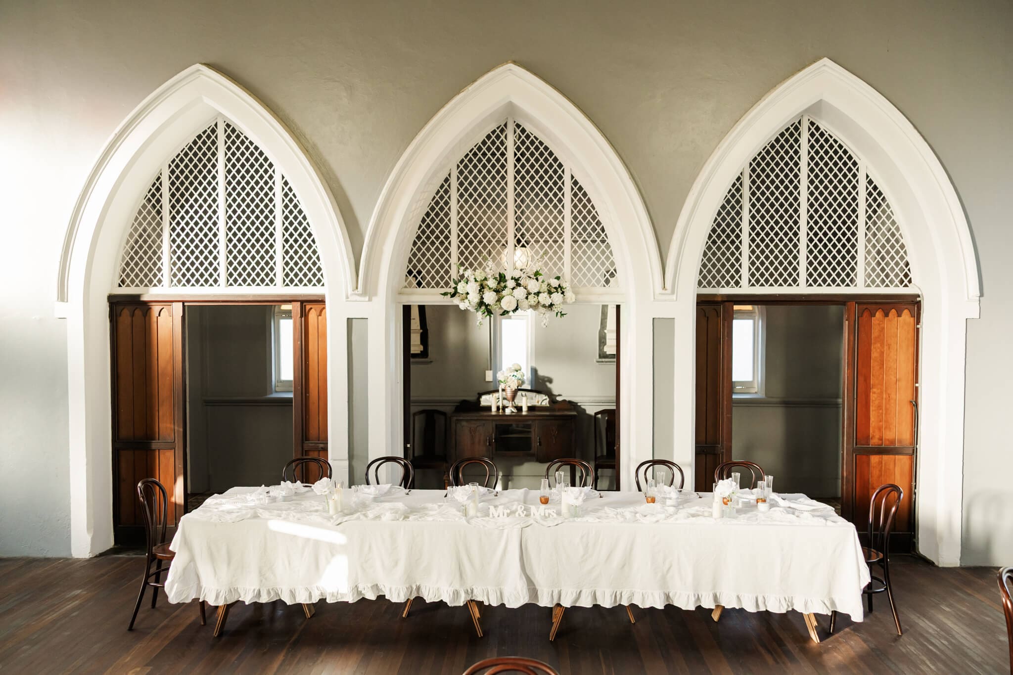Stunning decor at Church Events Rockhampton. Featured here is a bridal table at a wedding reception
