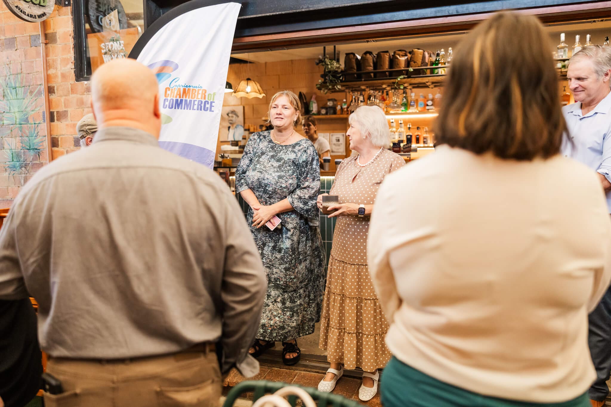 Business people get up to discuss who they are and what their business is at the Capricornia Chamber of Commerce event.