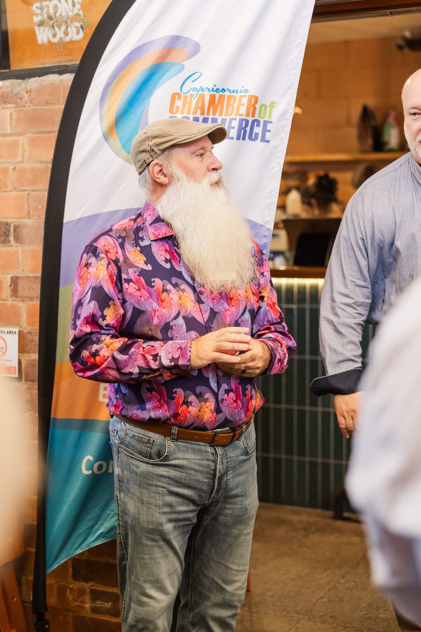 President of the Chamber of Commerce looking over the event. Location at The Alley, Yeppoon.