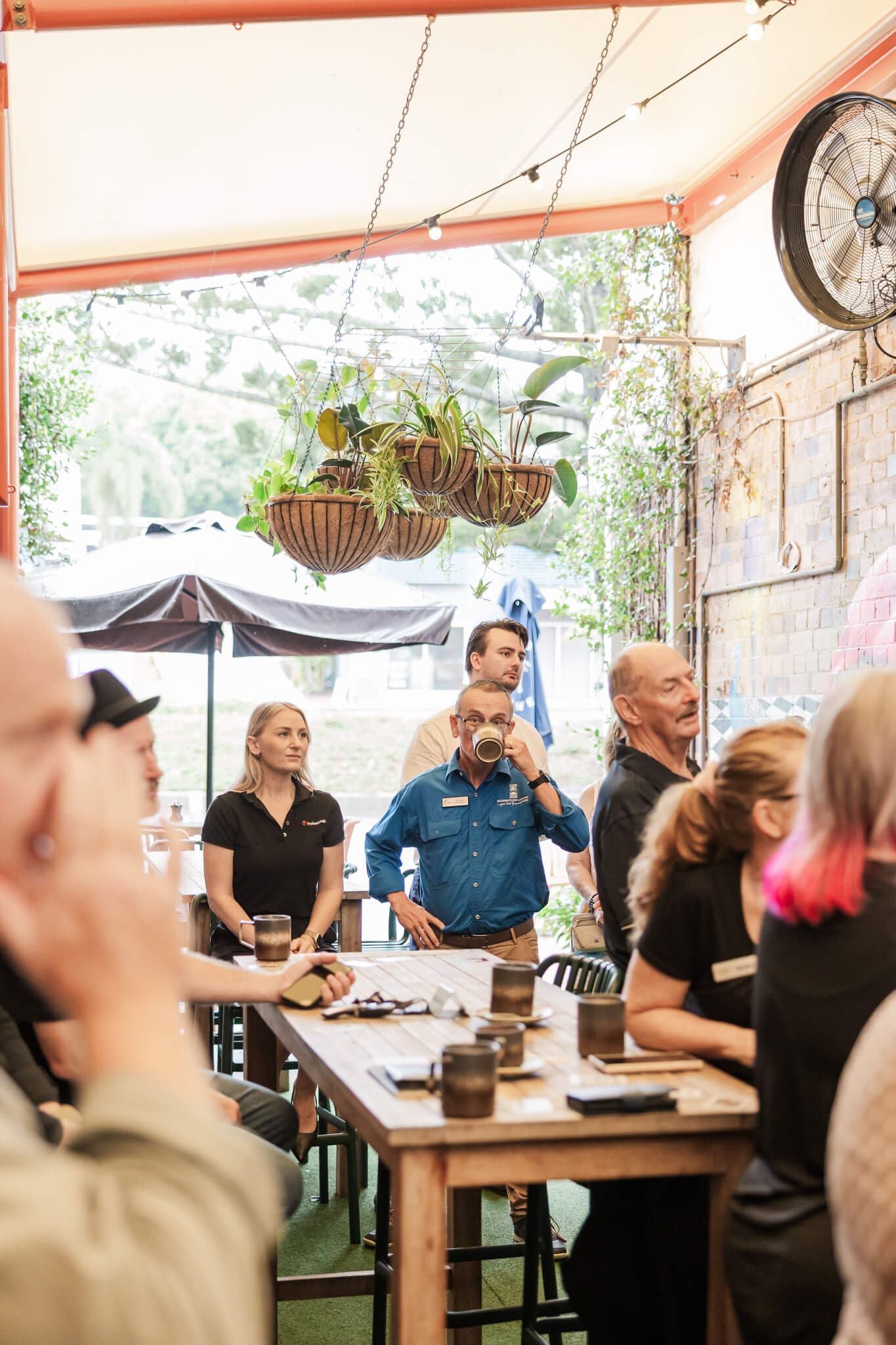 Members of the Capricornia meet and drink coffee at an event in Yeppoon