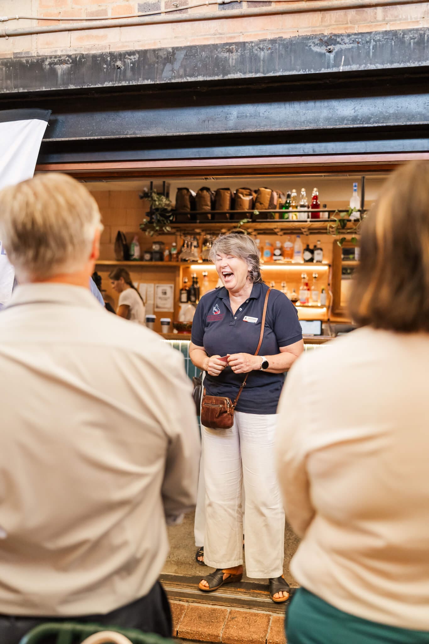 Business woman chats and has a laugh at the Capricornia Chamber of Commerce event in Yeppoon.