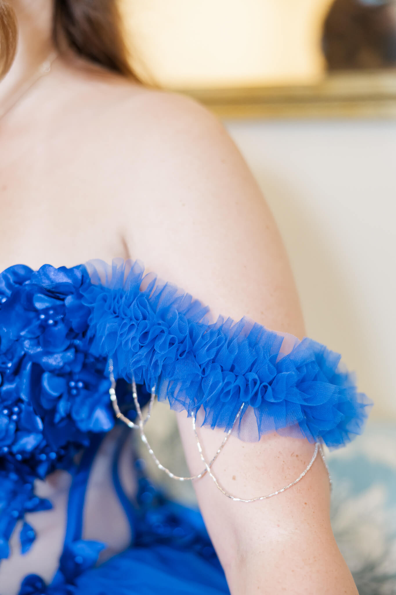 Detail of a custom made blue gown - the delicate off sleeve piece.