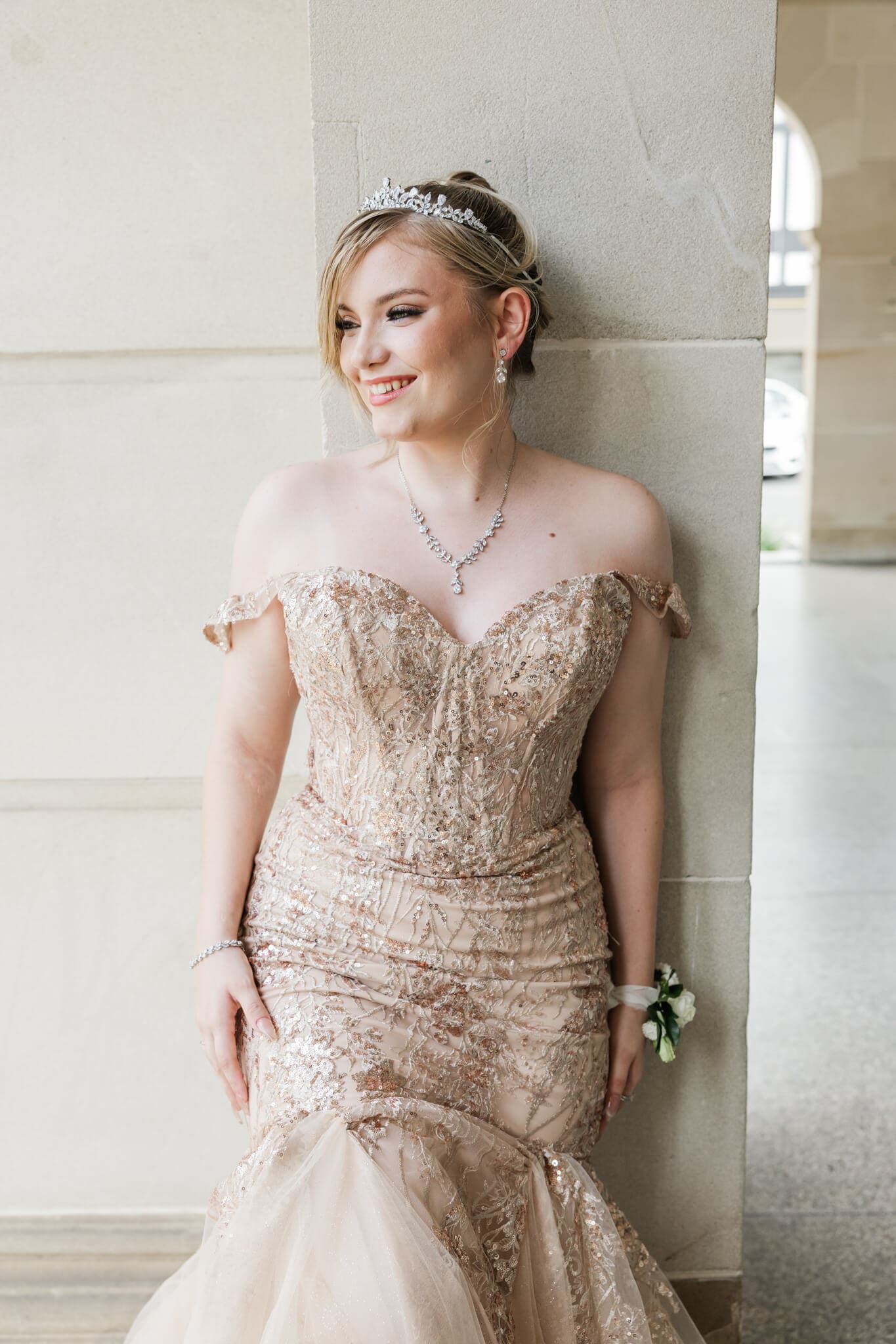Graduate wearing a stunning Oak and Valentine Gown for her formal photography session.
