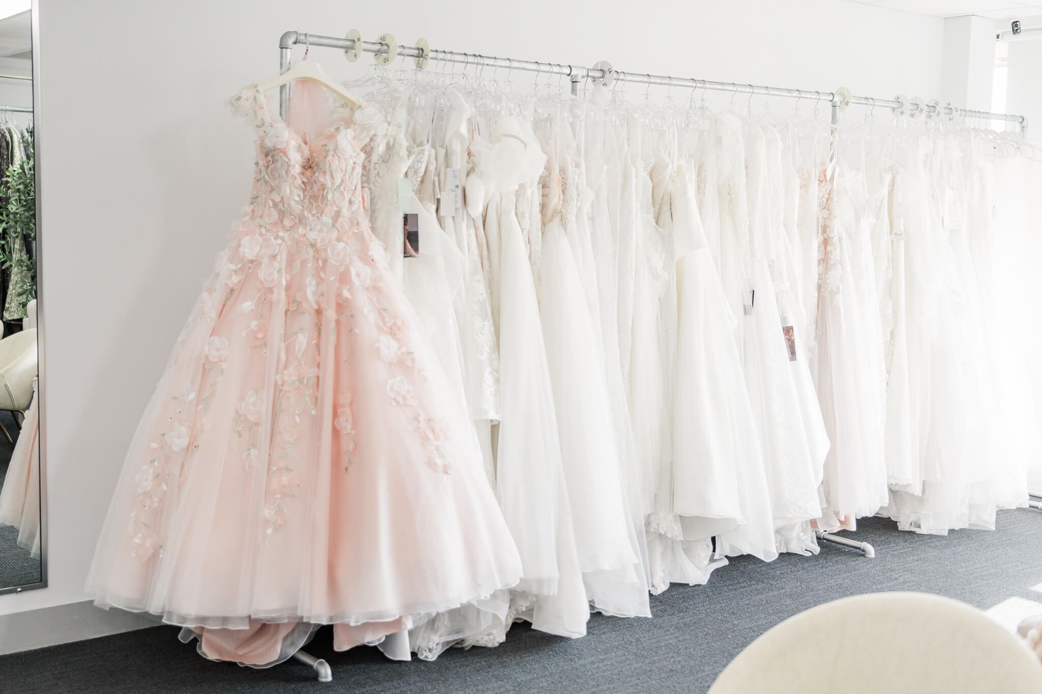 Rack of bridal dresses in a wedding dress store in Rockhampton.