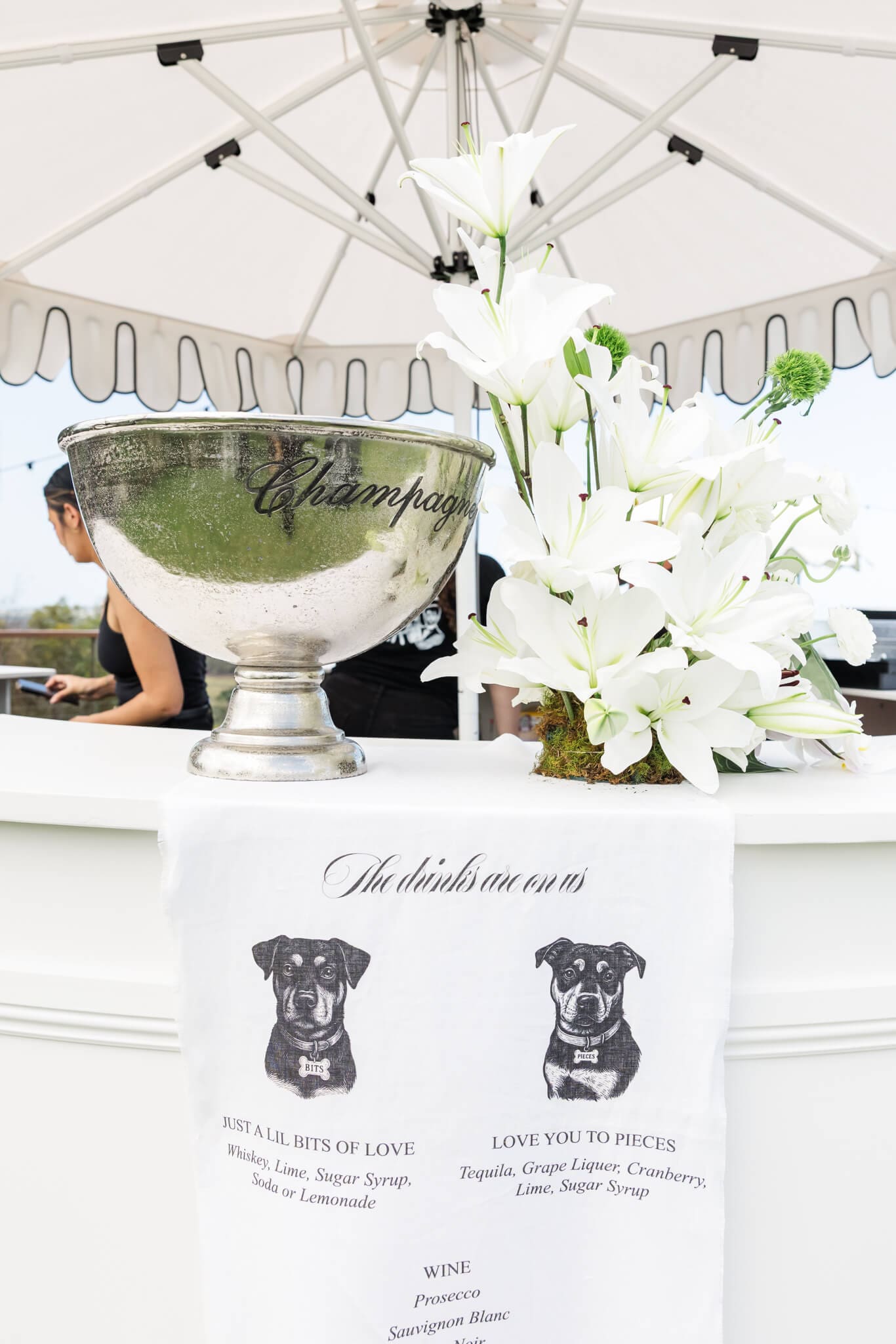 Luxury wedding styling featuring white orchids and personalised drapery.