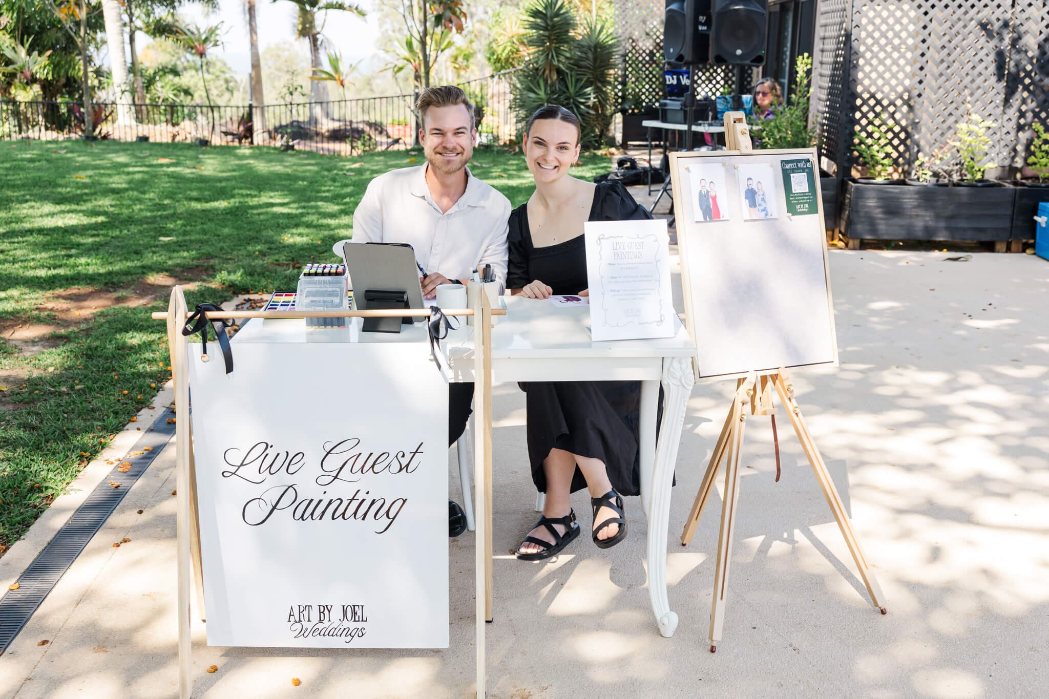 Art by Joel doing live guest paintings at a Yeppoon wedding.