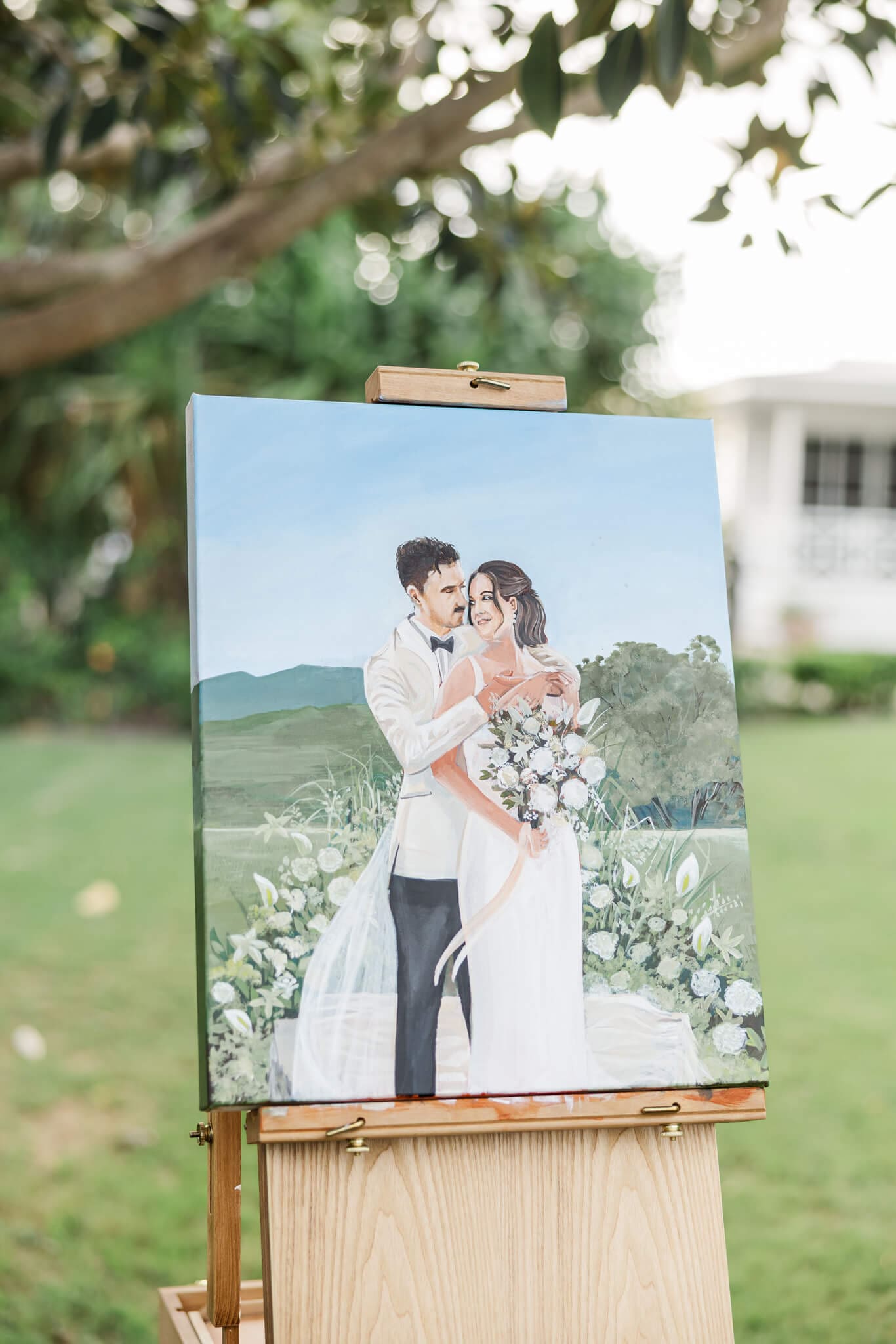 Finished product of a canvas painting of the bride and groom on their wedding day, created by Art by Joel.