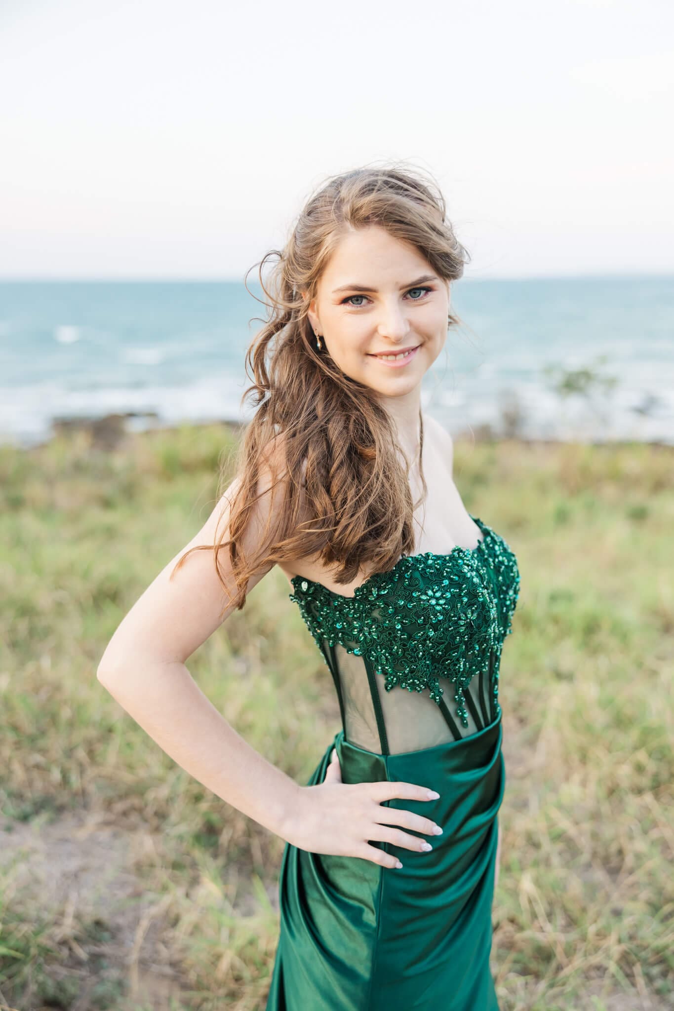 Stunning pre formal photography, of a young girl in a green gown, captured by Julie-Anne Photography
