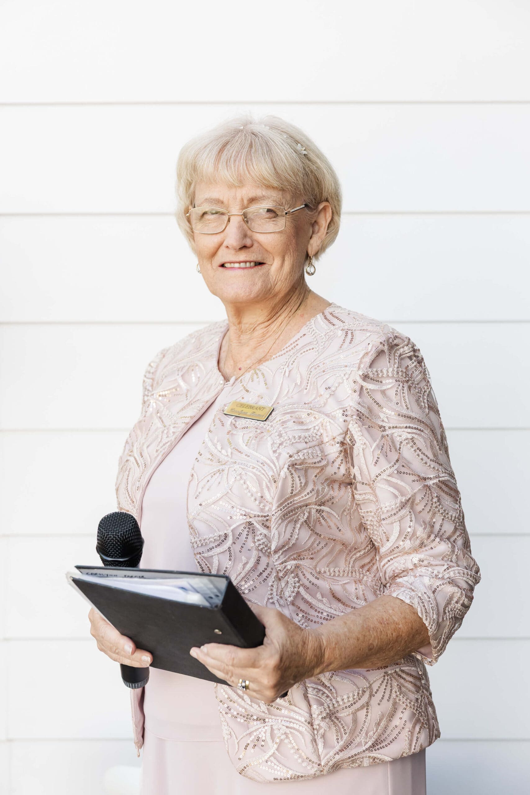 Central Queensland marriage Celebrant Carolynn Farmer poses for a headshot.