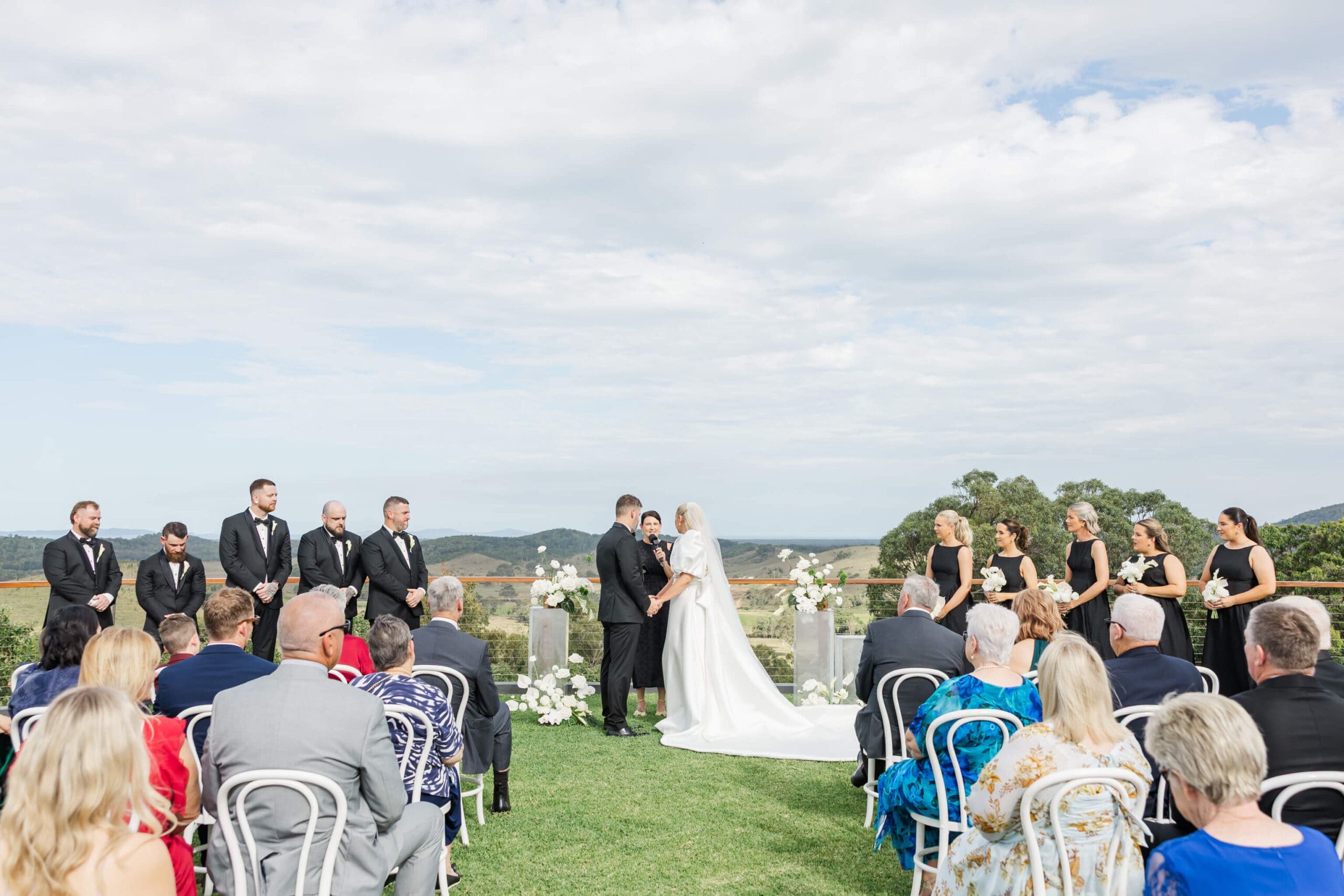 A beautiful wedding ceremony officiated by Krystal Feather at a luxury Yeppoon wedding venue.