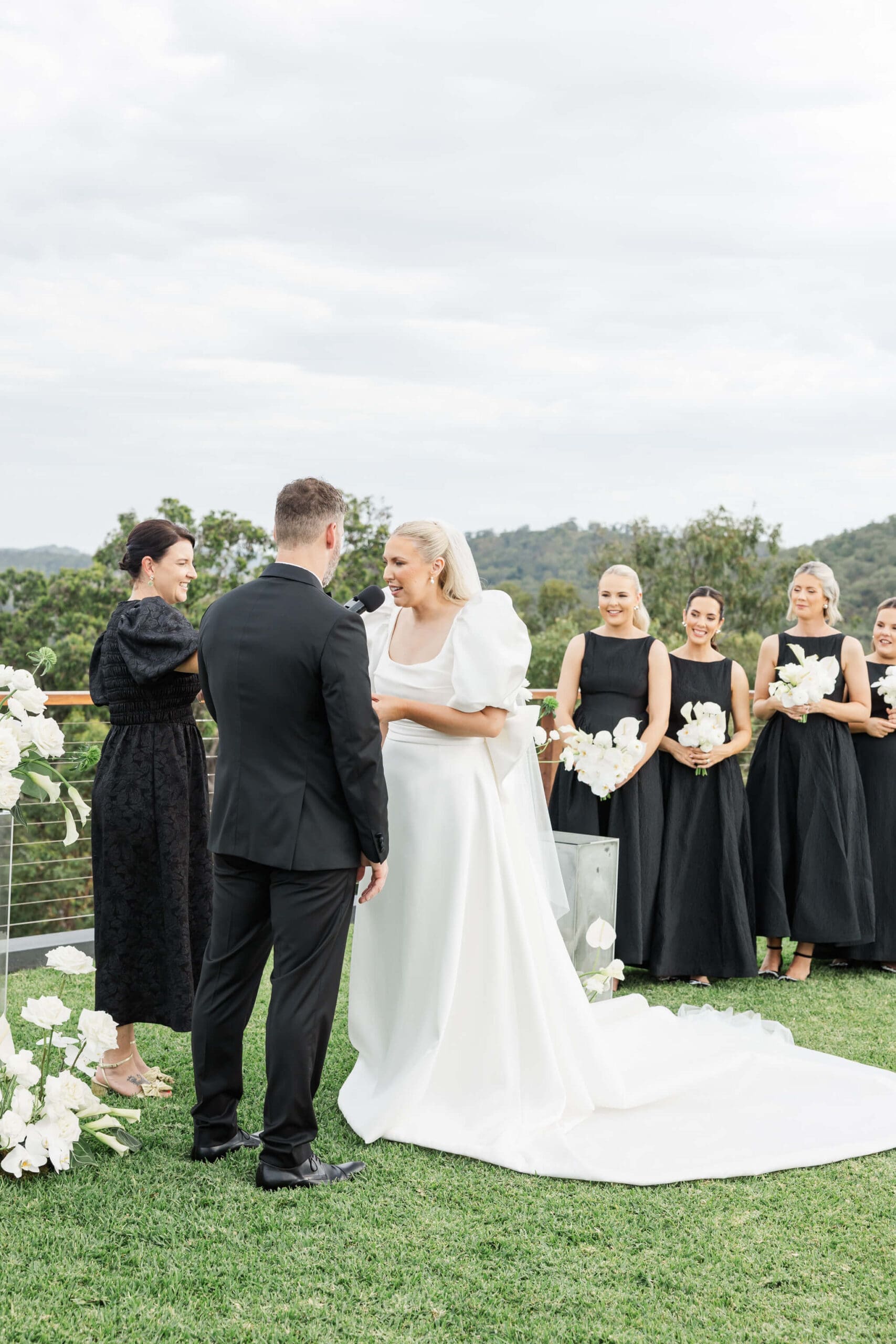 Krystal Feather, a Rockhampton marriage celebrant, marries a couple at a Yeppoon wedding venue.